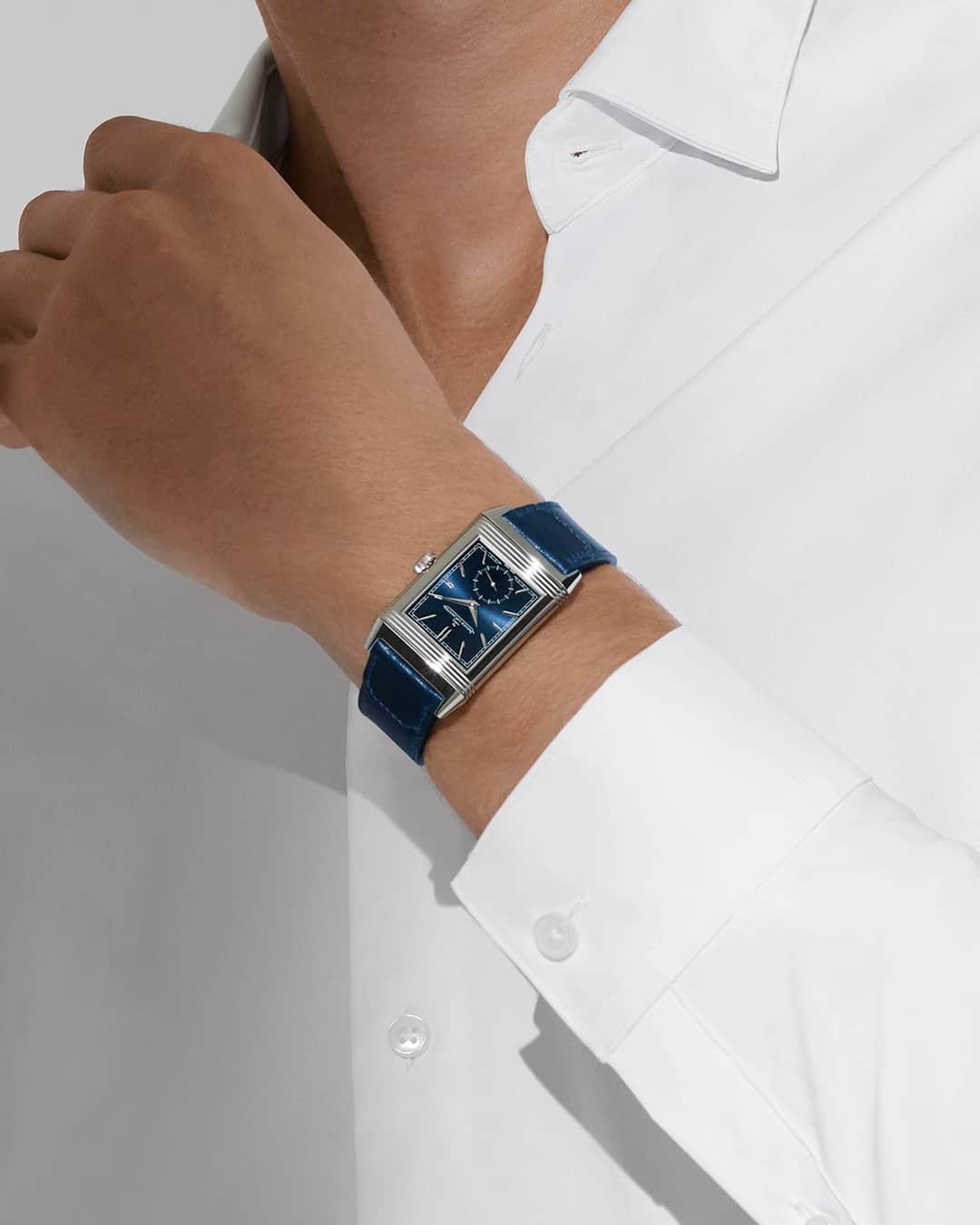 ジャガールクルトのインスタグラム：「Reverso, your better half.  #Reverso _ Reverso Tribute Small Seconds _ Reveal your second half with the Reverso Tribute and lose yourself in the deep blue hues of its dial. A model dating from the 1930s, offering one face towards the present and another to its legendary history. Could it be the gift of a lifetime? _ #JaegerLeCoultre #Reverso #JLCGift #ValentinesDay #Style #ArtDeco #Icon #HomeofFineWatchmaking #SwissWatch #ValleeDeJoux #Watchmaking #Craftsmanship #SavoirFaire」