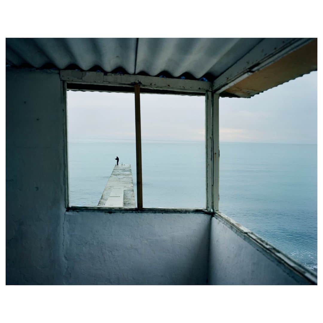 Magnum Photosさんのインスタグラム写真 - (Magnum PhotosInstagram)「@rafal.milach grew up in Poland during the collapse of the Soviet Union and as a result his work often uses the transformation of the former Eastern Bloc as a lens through which to understand wider issues. His project Black Sea of Concrete, which takes as its subject the grey coastlines of Ukraine, documents a landscape that is struggling with the physical reminders of a difficult past.⁠ .⁠ A collection of 22 fine prints from this project is now available on the Magnum Shop.⁠ .⁠ Link in bio to explore Milach's collection.⁠ .⁠ PHOTO: Sea view of Alushta one of the most popular sea resorts in Crimea. Ukraine, Crimea, Alushta 07.12.2008⁠ .⁠ © @rafal.milach/#MagnumPhotos」2月11日 19時01分 - magnumphotos