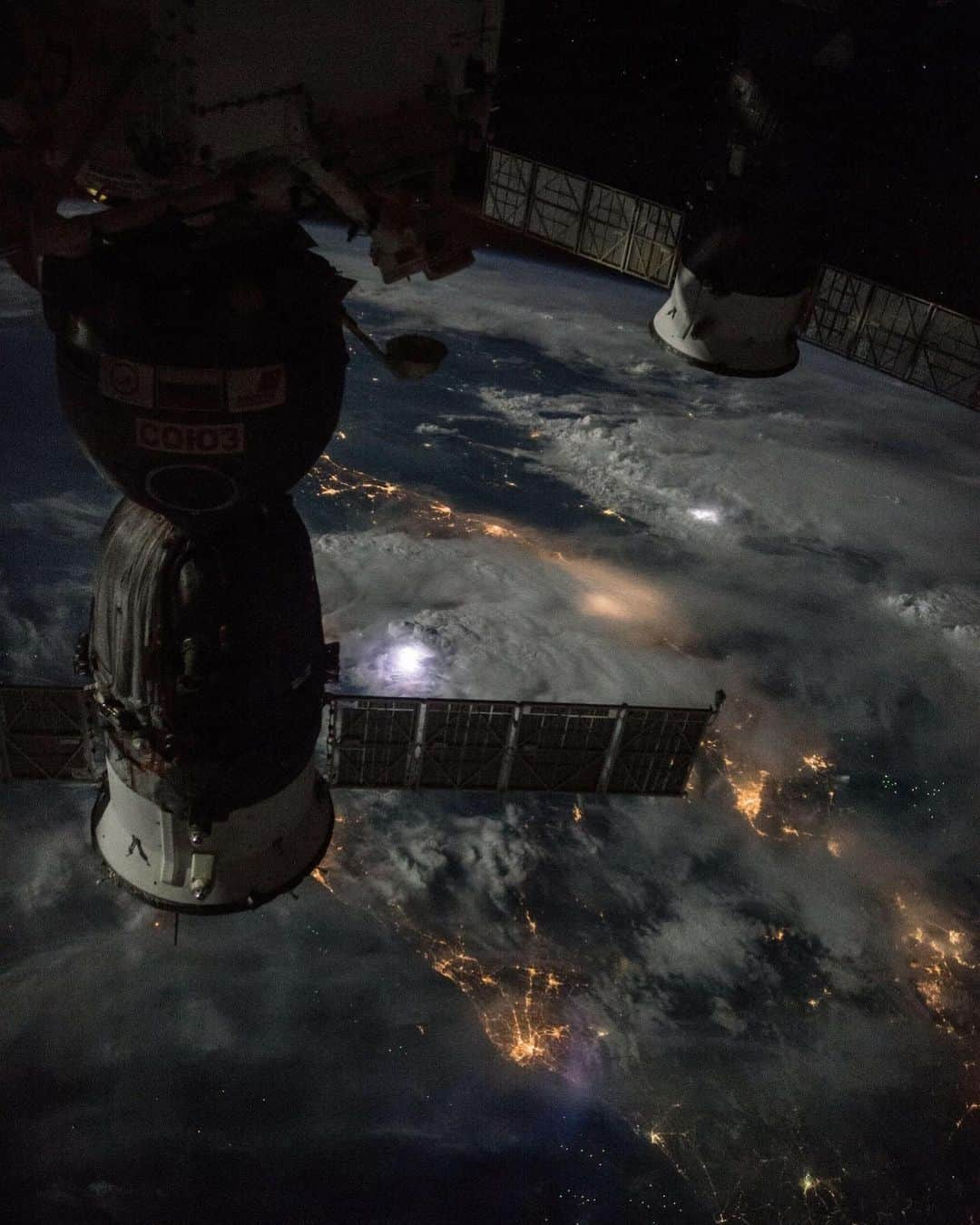 NASAさんのインスタグラム写真 - (NASAInstagram)「To see beauty is to see light🌩️  High in the sky on September 18, 2016, the International Space Station (@ISS) journeyed approximately 250 miles over thunderstorms visible in Malaysia during a nighttime pass. Here you can see the brilliant strikes of lightning flashing inside the heavy swirl of dark clouds in a majestic performance of bad temper. A Russian Soyuz spacecraft (left) and Progress spacecraft (right) are seen in the foreground. Our world is magic.  How many times hotter is lightning than our Sun?  ⚡⚡ Two times?  ⚡⚡⚡Three times?  ⚡⚡⚡⚡ Four times? Comment below!  Credit: NASA  #NASA #Lightning #Galaxy #Views #Astronomy #Earth #MotherNature #LightningBolts #Malaysia #Soyuz #TBT」2月12日 1時11分 - nasa