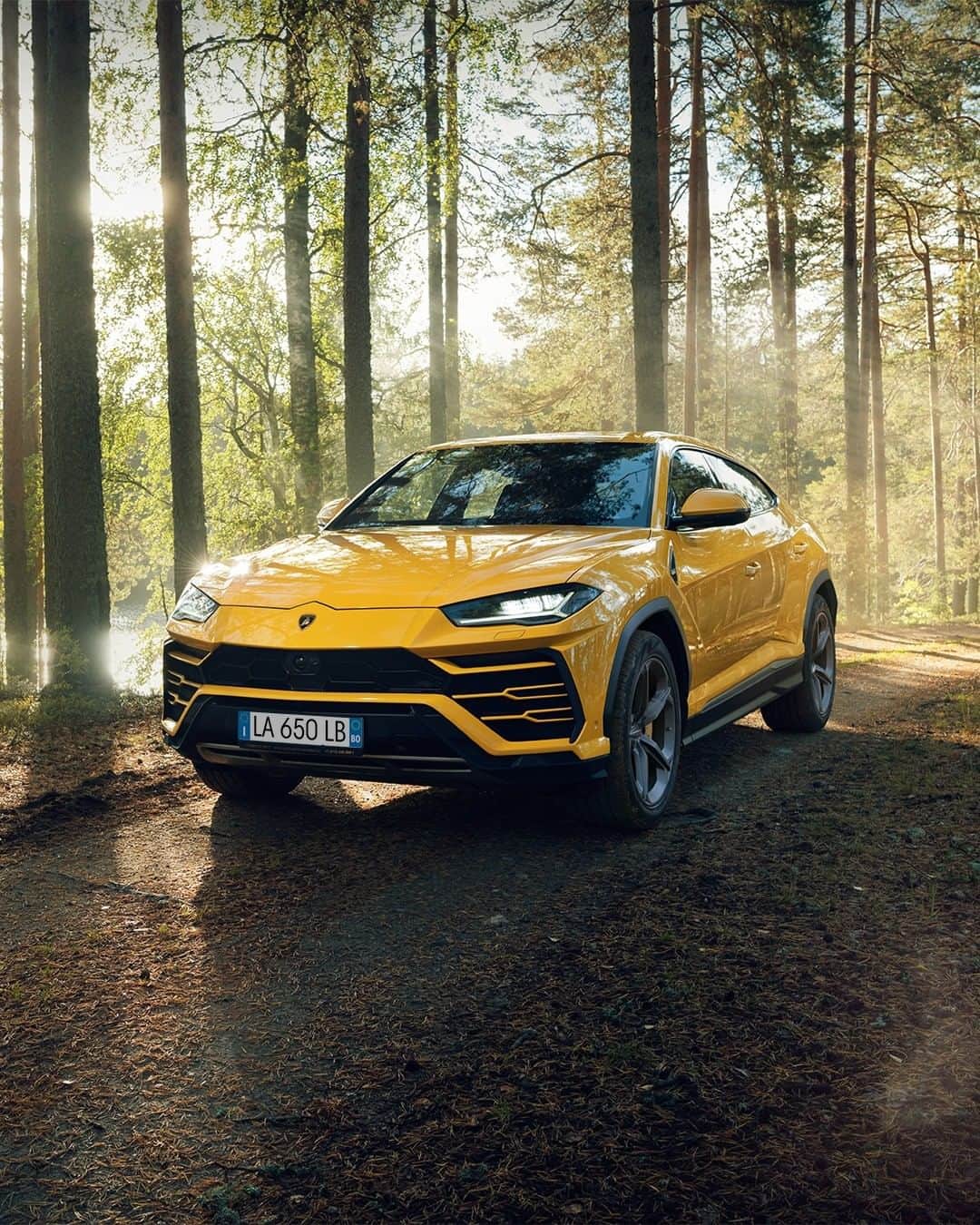 ランボルギーニのインスタグラム：「It’s not just unlocking a road. It’s feeling it like you never did before.  #Lamborghini #Urus #UnlockAnyRoad  __   Urus: Fuel consumption combined 12.7 l/100 km; CO2-emissions combined 325 g/km (WLTP)」