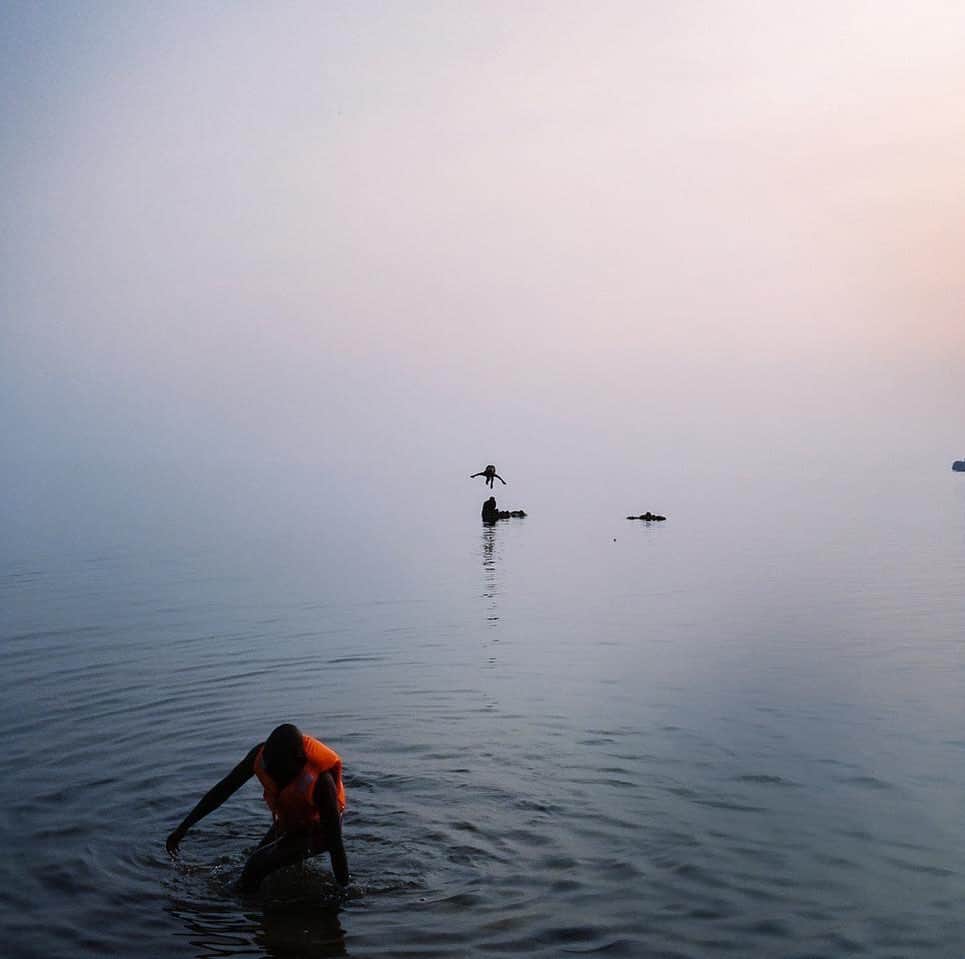thephotosocietyさんのインスタグラム写真 - (thephotosocietyInstagram)「Photo by Michael Christopher Brown @michaelchristopherbrown. Late afternoon swimmers bathe at the northern end of Lake Kivu, near the border of Rwanda and Democratic Republic of the Congo.」2月12日 4時05分 - thephotosociety