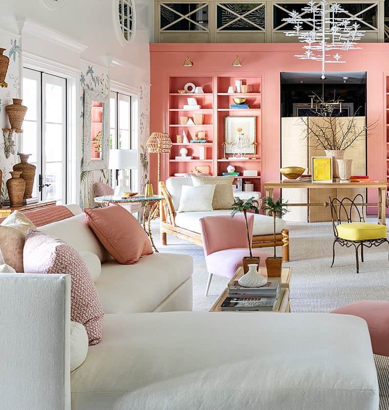 Homepolishのインスタグラム：「Bubblegum pinks and crisp whites provide the base for a pretty pastel environment while @benjaminmoore Custis Salmon paint adds a high-gloss finish to tonally coordinated bookcases. Design @suzannekasler, photo @sargentphoto.  Check out more pro tips and design inspo at the link in bio.」