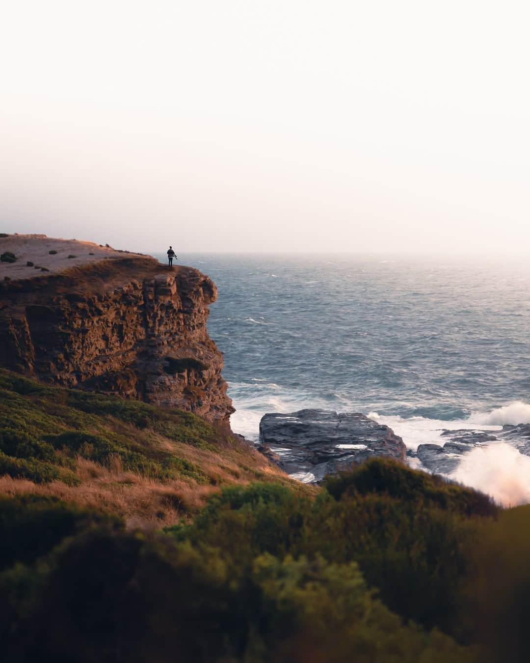 Nikon Australiaさんのインスタグラム写真 - (Nikon AustraliaInstagram)「"My partner and I love walking along coastlines. The stretch between San Remo and Kilcunda is beautiful. It was very misty with colourful conditions at sunset but I've added some additional orange in post production to give vibrance and pop.   Also being very careful when walking out onto any cliff face. Make sure research is done, the area is safe and environmentally friendly to do so." - @patricksflicks   Camera: Nikon Z 6 Lens: NIKKOR Z 24-70mm f/2.8 S Settings: f/2.8  1/500s  ISO 200  #Nikon #MyNikonLife #NikonAustralia #NikonZ6 #Z6 #ZSeriesAU #TravelPhotography #LandscapePhotography #LandscapeLovers」2月13日 7時00分 - nikonaustralia