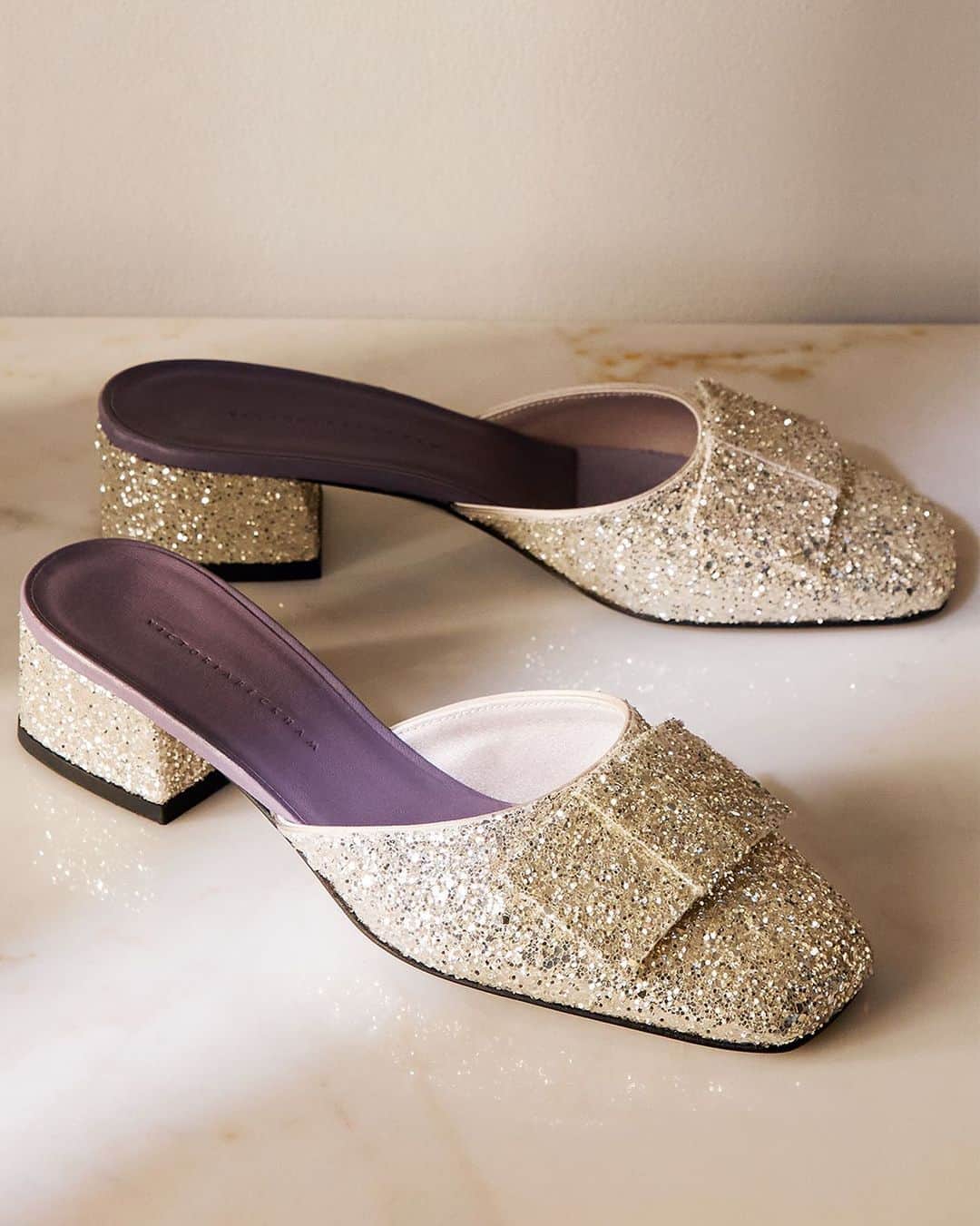 The Outnetのインスタグラム：「@VictoriaBeckham is making every day a party with this oh-so-glittery slip-ons.    Shop all your favorite Instagram looks, just visit the link in bio」