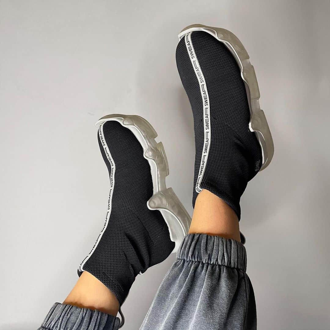 スウェアのインスタグラム：「The AIR Trigger in black and white is available online at Farfetch.com and the good news is that it will be shipped to you in 48hours time. Get your neoprene sock boots with the most iconic transparent sole. #swearlondon」