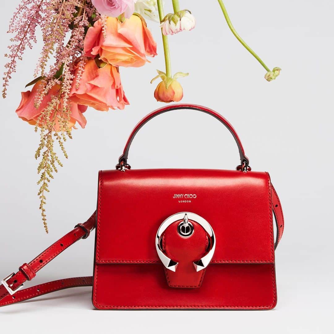 Jimmy Chooさんのインスタグラム写真 - (Jimmy ChooInstagram)「A pop of colour provides an instant update to trans-seasonal style. Discover the MADELINE satchel in bold royal red. #JimmyChoo #JimmyChooMADELINE」2月14日 0時01分 - jimmychoo