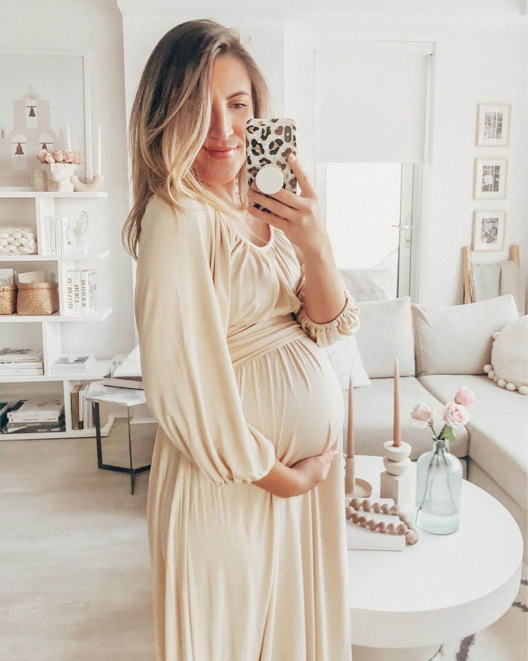のインスタグラム：「Read on my pregnancy app that I’ll be entering the third trimester soon...and I’m 🙀😍 so it’s time to start planning this little girl’s nursery. Tag some of your fave places to shop for decor and furniture in the comments below 💗 I already have some ideas flowing but so excited to start seeing it come together. Can’t believe how quickly time is flying! Ps. Speaking of time, I bought this maxi dress back in 2014 and it turns out it is incredibly bump friendly! Linked similar dresses from the same designer that would be perfect for a maternity shoot here: http://liketk.it/38h5j @liketoknow.it #liketkit #LTKbump #LTKbaby #LTKfamily #dressthejollybump #babyjolly #maternitydress #24weeks #maternitystyle」