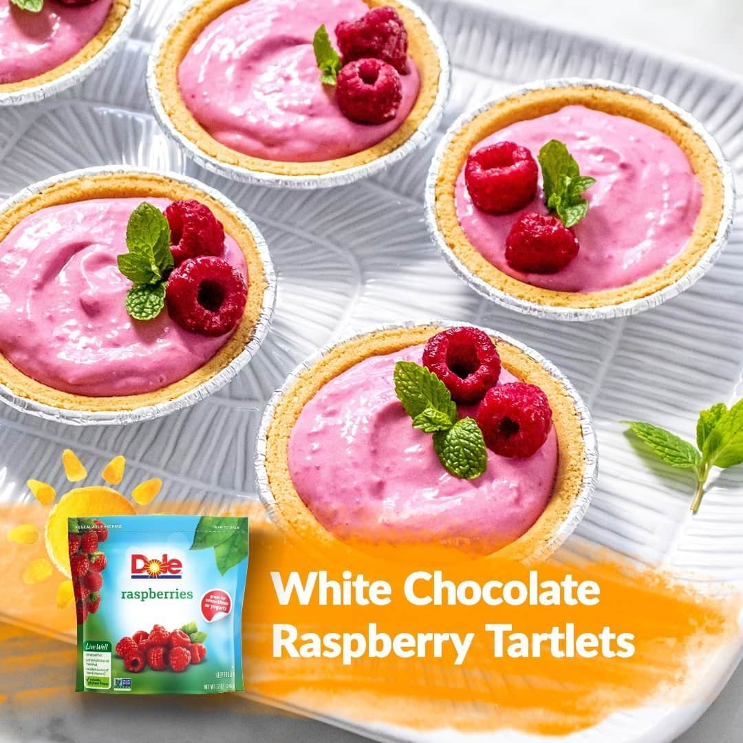 Dole Packaged Foods（ドール）のインスタグラム：「The secret to this easy Valentine’s Day dessert? Tofu! 💕   INGREDIENTS 10 ounces soft tofu, drained 1 teaspoon lemon zest 1 teaspoon fresh lemon juice 2/3 cup white chocolate chips, melted 1 cup DOLE® Frozen Raspberries, plus additional for garnish, partially thawed 6 mini graham cracker pie crusts  DIRECTIONS 1) Slice tofu and place on paper towel-lined baking sheet. Place additional paper towels on top of tofu. Place a pan on top of tofu to press out moisture. Let stand 10 minutes. 2) Combine tofu, lemon zest, lemon juice, and white chocolate in food processor. Cover; blend until smooth. Add raspberries and blend until smooth. 3) Fill pie crusts and chill for 1 hour until set. 4) Garnish with mint and additional raspberries, if desired.」