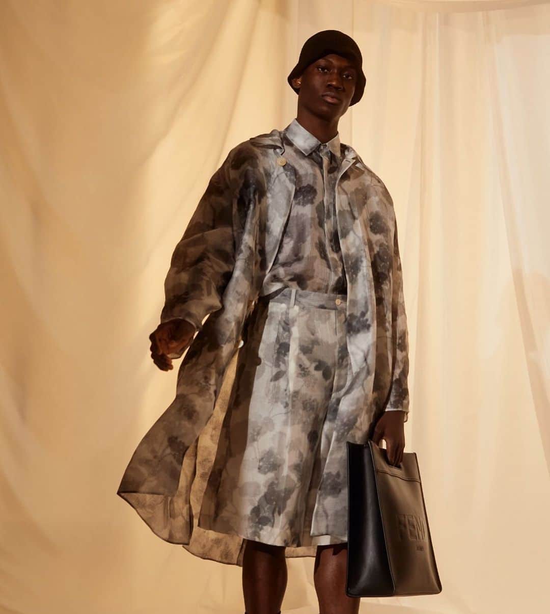 Fendiのインスタグラム：「Shadow and light. Filled with soft yet structured shapes and faded, nature-inspired prints, the #FendiSS21 men’s collection blends romantic and utilitarian influences to create truly expressive pieces.  Photographer: @josh._.hight Stylist: @ganio Models: Felix Cheong Macleod, Jean Augnet and Alexander Carey Morgan」