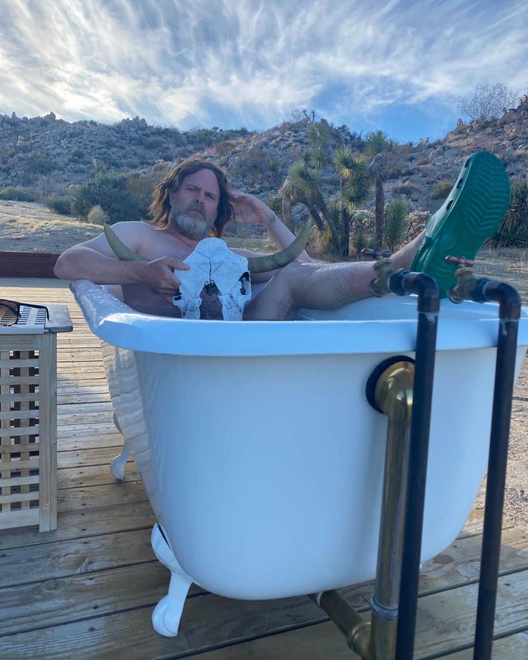 レイン・ウィルソンのインスタグラム：「I’d like you to meet one of my favorite radio personalities and podcast hosts of all time, @TerryCarnation. He recently did a pretty remarkable photo shoot in Joshua Tree, California. He’s the master of the twisted tale, the impresario of madness, the duke of the occult, the pope of the paranormal! His hair is as luxurious as his voice. You enjoyed him on @RadioRental? Well Apparently his new audio show “Dark Air” will be released on April 1 (@AudioBoom) and it will knock your @Crocs off! Please follow him for more delicious nuggets:: @terrycarnation」