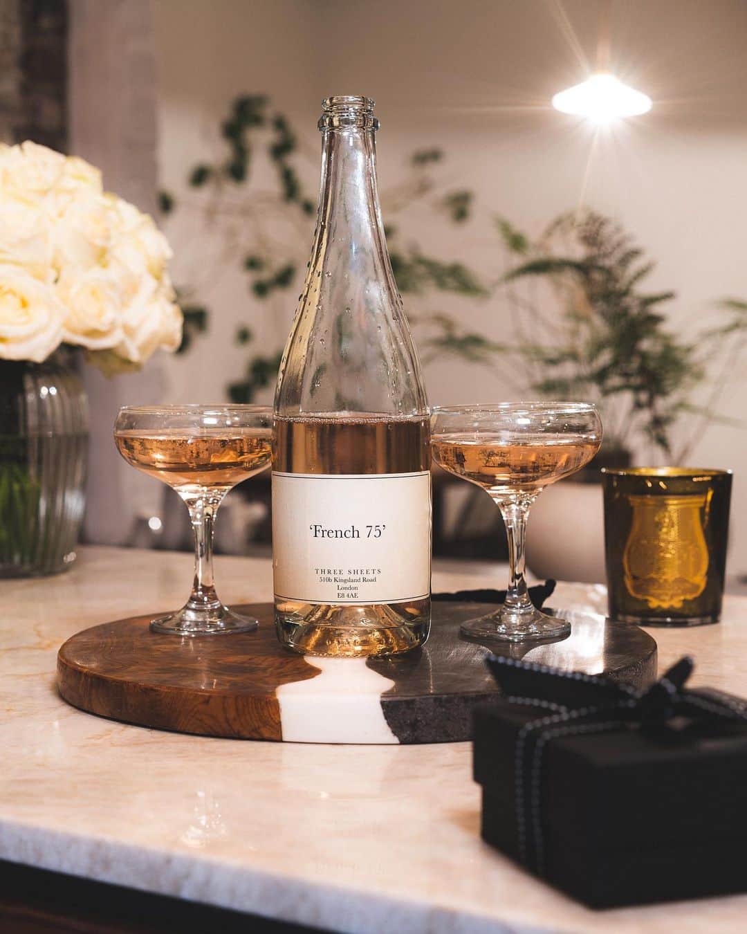 MR PORTERのインスタグラム：「Whether you are spending Valentine's Day with your significant other, a friend or riding solo, we encourage you to pour yourself something special (we're opting for a chilled bottle of @threesheetslondon French 75) and celebrate love in all it's forms. Happy Valentine's Day 🤍💫  Shop the story: KINGSMAN - + Higgs & Crick Set of Two Crystal Champagne Coupes  Cire Trudon - Madeleine Scented Candle, 270g」