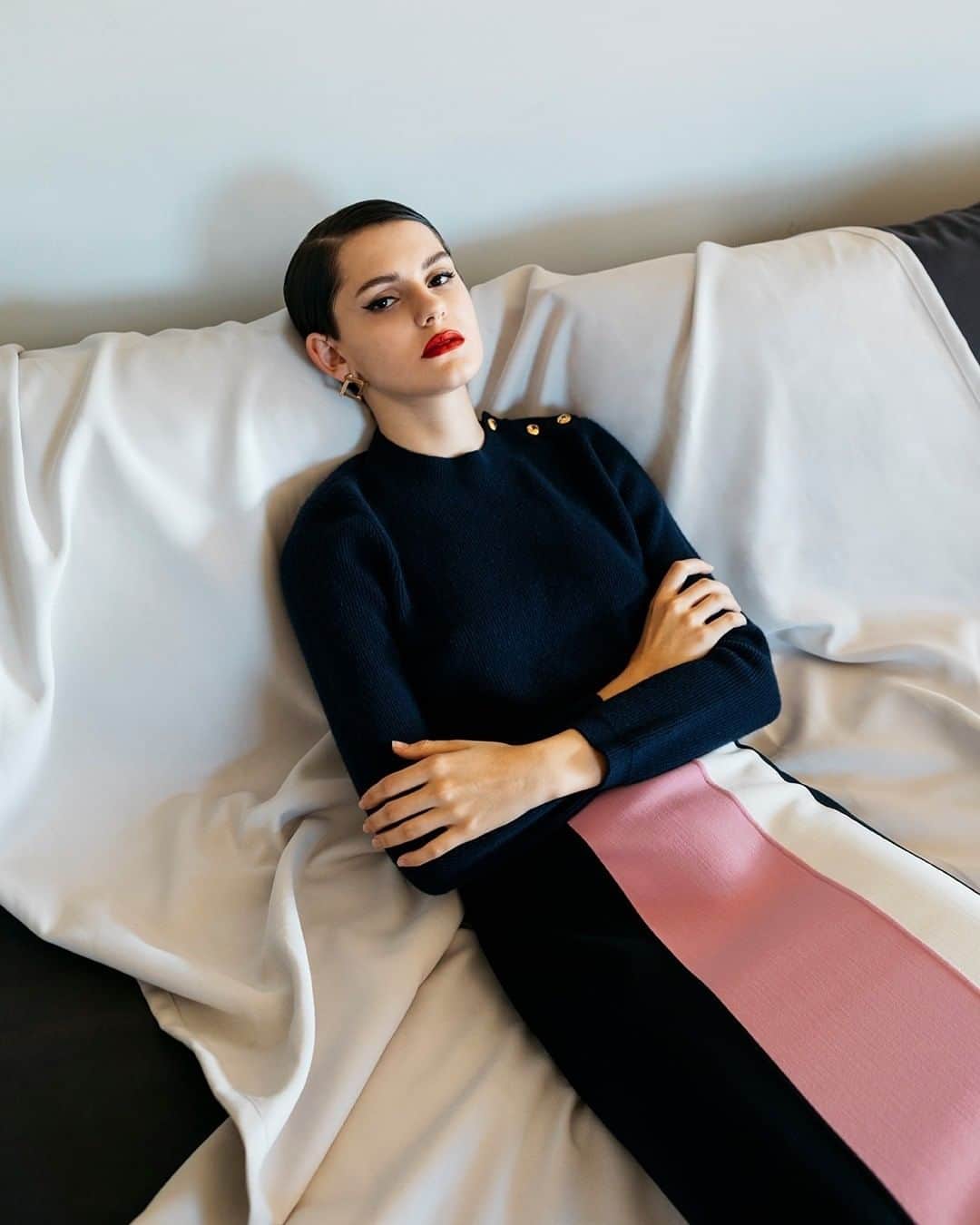 ミラショーンのインスタグラム：「Sintax of a radical sitting. ⠀ ⠀ ⠀ #milaschon #longskirt #pinkandwhitestripeskirt  #blackandpink #sweater #blackskirt」