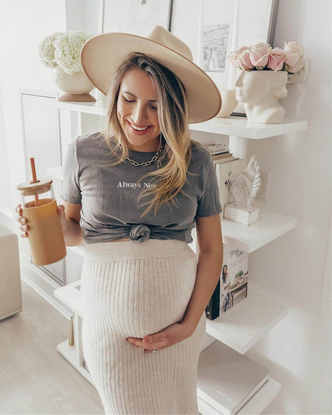 Stephanie Sterjovskiのインスタグラム：「Trying to wish spring into this space with my outfit & decor while another winter snowstorm looms outside... 😂 Also sharing some of my fave Amazon buys lately on the blog (including this glass tumbler) link in bio! . Outfit details linked here (wearing a small in this skirt and it’s stretchy/bump friendly even though it’s not maternity + a similar NY graphic tee I love): http://liketk.it/38pSn @liketoknow.it #liketkit #LTKbump #LTKbaby #LTKstyletip #dressthejollybump #jollyabode #babyjolly #amazonfaves #amazonfinds #springdecor #amazoncanada」