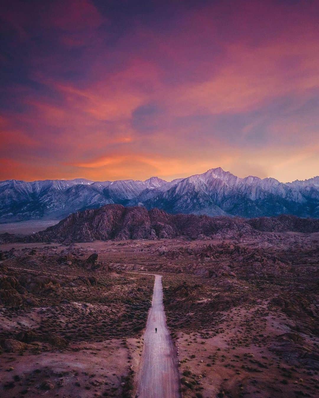instagoodのインスタグラム：「Welcome back to @RanzNav’s takeover of the day. This image was taken at my favorite stop along highway 395 in Lone Pine, California, USA. I’ve taken so many shots of this road but this is my first time using a drone to give it a whole different perspective. I got lucky and the burn was ridiculously beautiful at sunset. Swipe for another favorite drone shot of a place called Shiprock in New Mexico, USA. It’s crazy how a drone perspective changes the game by giving you an amazing bird’s eyeview from up above.」