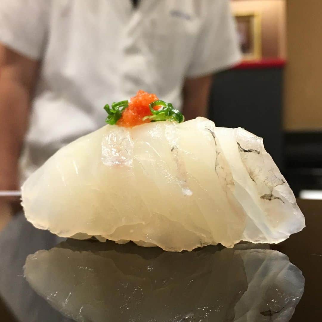 SUSHI KANDA • 寿司神田のインスタグラム：「Hirame  平目  For reservation: 02.712.6639 or 099.606.0013 Or add us on Line @kandarestaurants  #sushikanda#sushi#japanesecuisine#sashimi#foodporn#aroi#aroiibkk#ginraidee#paigingun#wongnai#edtguide#bkkmenu#starvingtime#寿司神田#寿司」