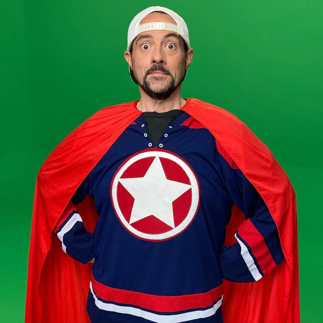 ケヴィン・スミスさんのインスタグラム写真 - (ケヴィン・スミスInstagram)「It’s SUPER MEGA AWESOME ULTRA GUY! A few years back, I was a guest on Ask The @storybots - an excellent kids’ show on @netflix! Of all the things I’ve made or been in, not a week goes by when I don’t hear from some parent who Tweets or writes “I was watching this show with my kid and suddenly, you were flying around in it!” So on Friday, I was lucky enough to return to the role I originated when @espiridellis brought me back to do more episodes of Storybots, including the desolation of SMAUG (Super Mega Ultra Awesome Guy)! Many thanks to the always awesome @theartistred, who made me up to look heroic and fixed all my cape fears! And since we were both Covid tested in advance of the shoot, we played it risky for 30 seconds to snap selfies sans masks in the dressing room before hitting the green screen stage! It’ll be a minute before this episode is done, so I’ll let you know when it’s gonna air! #KevinSmith #storybots #theartistred #supermegaawesomeultraguy #cape #superhero」2月16日 7時36分 - thatkevinsmith