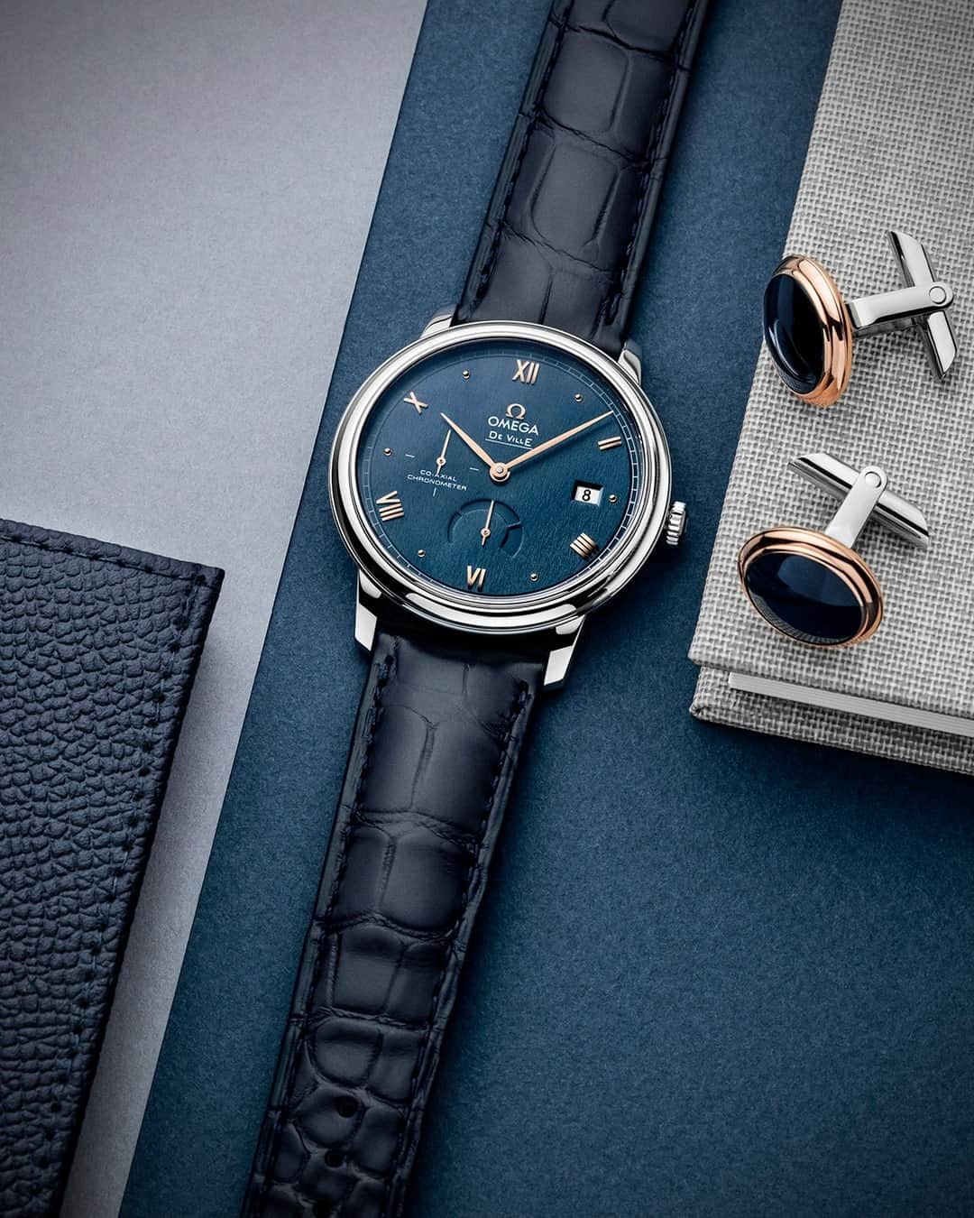 オメガのインスタグラム：「#DeVille Everyday elegance. The De Ville Prestige Power Reserve in steel with blue leather strap.」