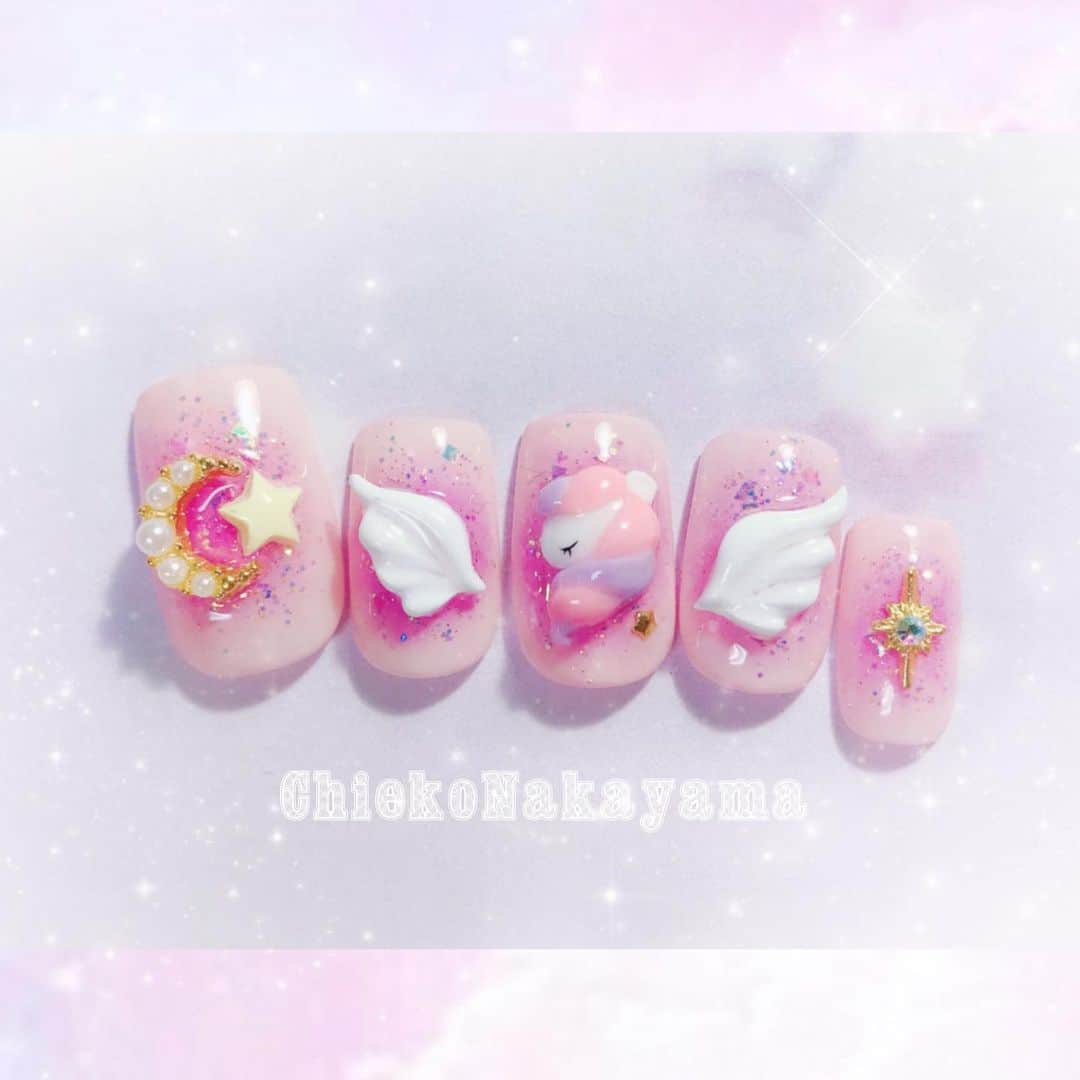 なかやまちえこのインスタグラム：「Dreamy kawaii nails.⠀ ⠀ 発売中のNAIL UP! @nailup_official 掲載ネイルです🌙⠀（いくつか組み合わせを作って並びで悩んだりしながら決めたりしてます） ⠀ #nail #nails #nailart #ネイル #美甲 #ネイルアート  #japanesenailart #manucure #japanesenails #manicurist #gelnails #أظافر #네일아트 #미용 #vẽmóng #ngườiđẹp  #เพ้นท์เล็บ #искусствоногтя #artedeuñas #เพ้นท์เล็บเจล #ジェルネイルデザイン #ネイルデザイン #senikuku #nagelkunst #ゆめかわ #ゆめかわネイル #kawaii #kawaiinails #ファンシーネイル #fancynails @pregelofficial @kimagure_cat_whim @bettygel_official @prexyofficial」