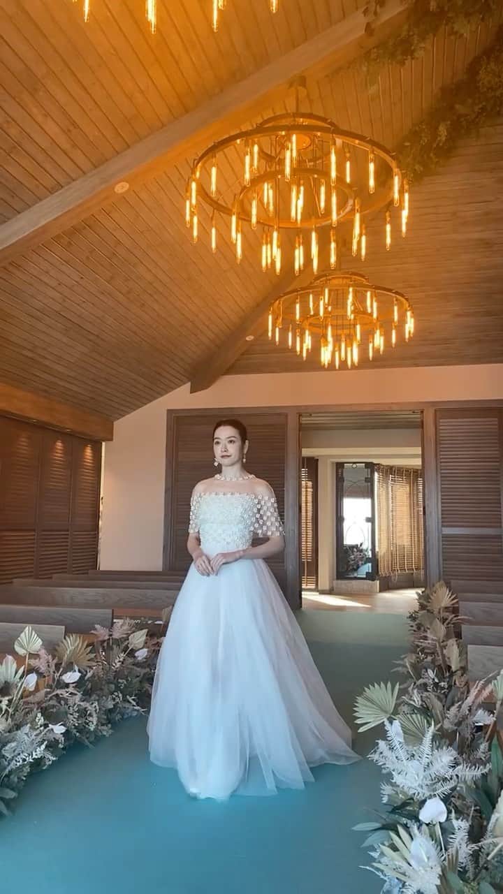 JUNOのインスタグラム：「Ocean&Resort MARIZON の新チャペル Sea View でのドレスショー動画です。  THE SWEET COLLECTION by JUNO より @reemacrawedding  @halfpennylondon  JUNOより @danahareldesign  @lenamedoyeffbridal  @naeemkhanbride   ファッションを愛する花嫁様へお届けしたい 厳選したドレスをお届けいたします。」