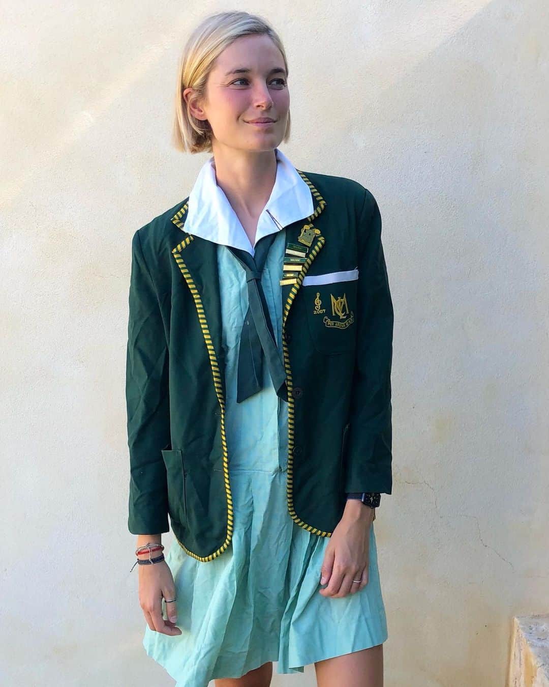 ブリジット・マルコムのインスタグラム：「This week, I have been working my way through the top hits of the early 2000’s. In honor of this, here I am last month in my high school uniform. Complete with bobby pins from my last day of year 12 👍🤘👏」