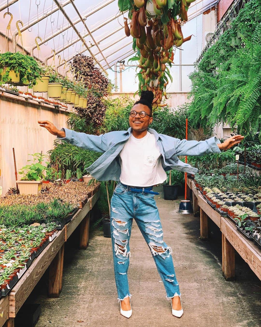 American Eagleのインスタグラム：「"When I think of inspiration, admiration, and Black, beautiful strong women, I think of my grandmother and my mother. My grandmother and my mother are and will forever be the original green goddesses in my life, who have introduced me to horticulture, to nature, to indoor gardening, and outdoor gardening. And They truly nurtured my inner Plant Kween from a very young age.”  Christopher, aka @plantkween, has been using their platform to grow community through plants; teaching us how to care for and nurture different plants through very green and joyful photos of the ~200 house plants in their Brooklyn apartment.   Christopher’s community is not just about botanicals, it’s also about radiating positivity and self-love.  “As a non-binary individual, I had to learn that it’s not men’s clothes, it’s not women’s clothes, if it’s on my body, it’s my clothes.”」