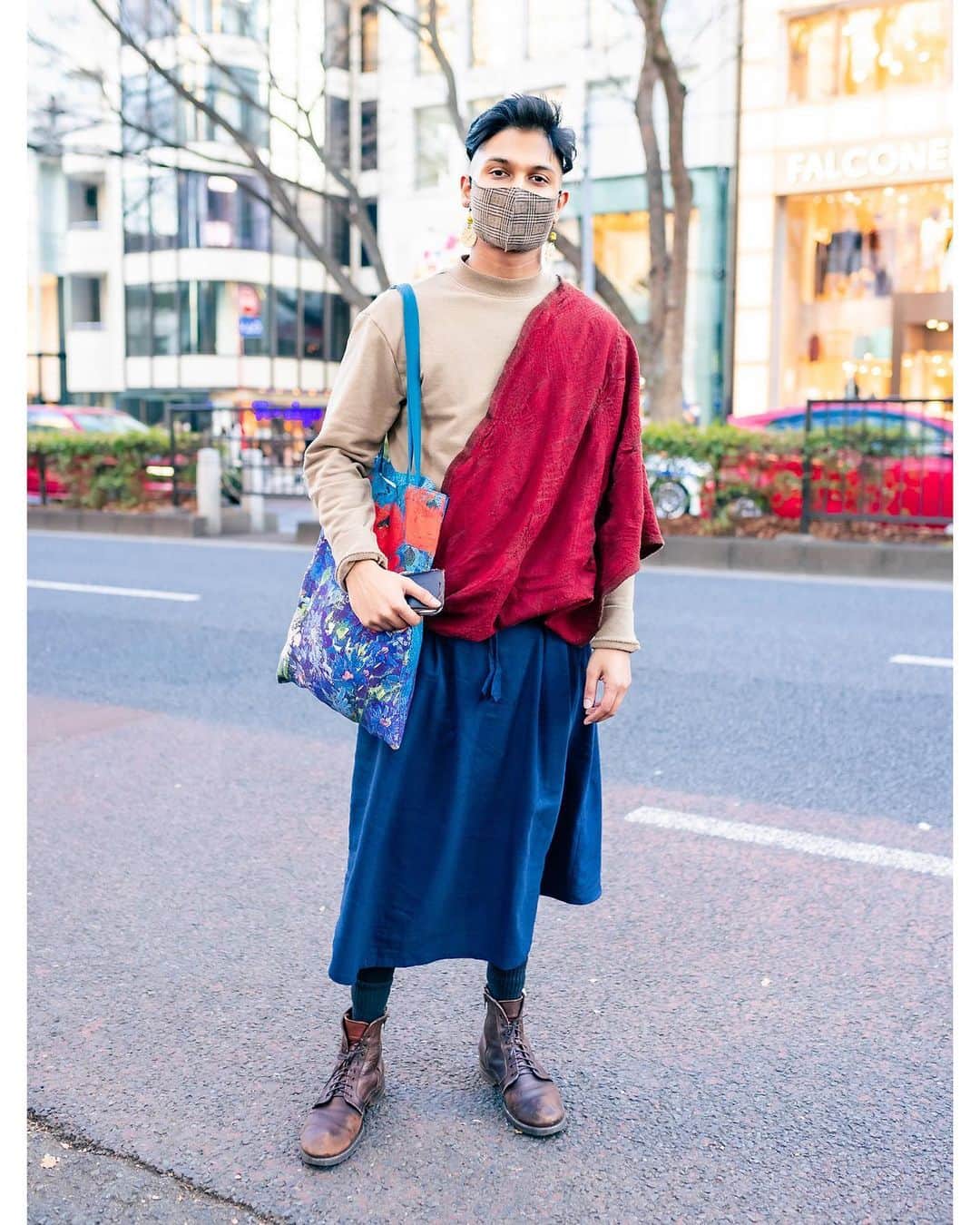 のインスタグラム：「Tokyo-based consultant Imran on the street in Harajuku wearing a look - featuring some items purchased in Nepal - that includes a shawl over a sweater, a linen skirt, leggings, a painted tote bag, and lace up boots.」