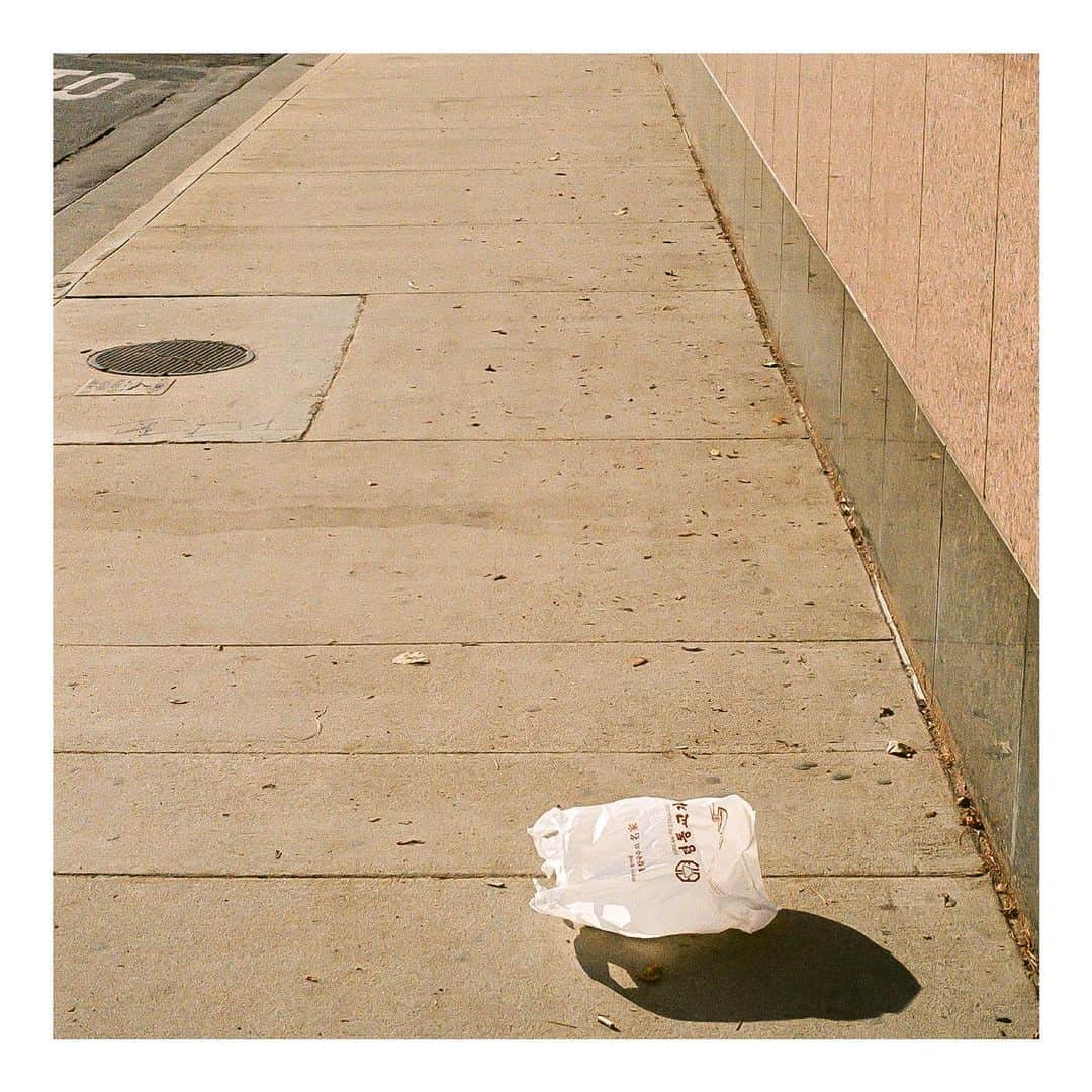 ル・ユースのインスタグラム：「Using this film photo of a bag to announce that I have new EP out next Friday. It’s coming out on one of my favorite record labels. Any guess what label?  Photo  Little Tokyo  Nikon FE2 Portra 800」
