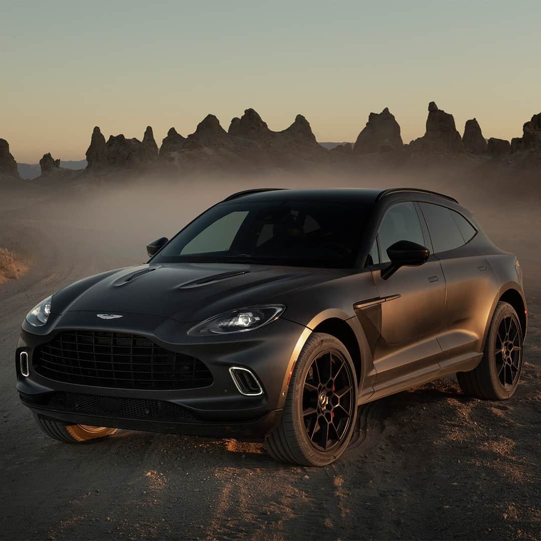 アストンマーチンのインスタグラム：「DBX is poised for adventure.  Click the link in our bio to book a test drive.  #AstonMartin #DBX」