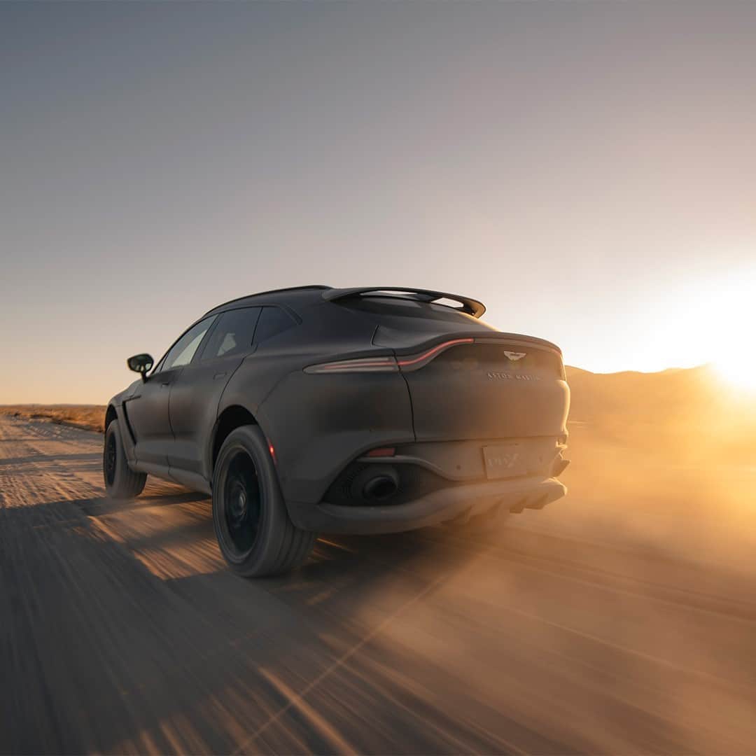 アストンマーチンのインスタグラム：「Where would DBX take you?  Click the link in our bio to book a test drive.  #AstonMartin #DBX」