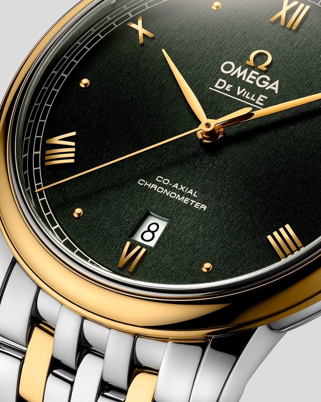 オメガのインスタグラム：「#DeVille It doesn't shout but it speaks volumes. The De Ville Prestige with PVD greened sun-brushed dial.」