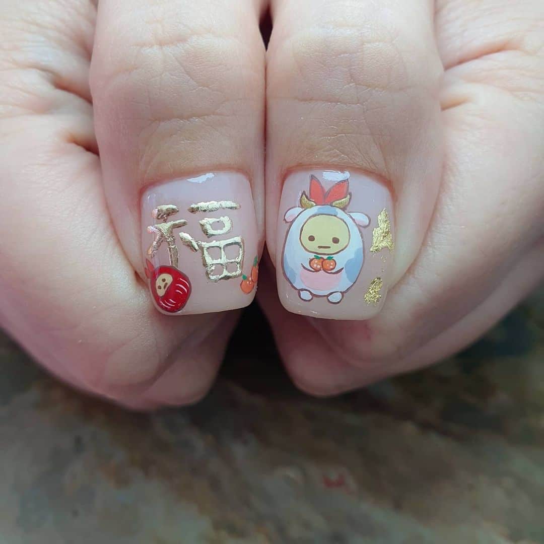 Yingのインスタグラム：「#sumikkogurashi themed CNY nails!   Base colours are PREGEL Tulle Grege and PREGEL MUSE M073. All art done with PREGEL Art Liner gels.  All items can be purchased at @nailwonderlandsg 🤗 . . . 🛒 www.nailwonderland.com⁣⁣ 📍20A Penhas Road, Singapore 208184⁣⁣ (5 minutes walk from Lavender MRT)⁣⁣ .  I am currently only able to take bookings from my existing pool of customers. If I have slots available for new customers, I will post them on my IG stories. Thank you to everyone who likes my work 🙏 if you need your nails done, please consider booking other artists at @thenailartelier instead ❤  #ネイルデザイン  #ネイルアート #ネイル #ジェルネイル #nailart #네일아트 #pregel #プリジェル #nails #gelnails #sgnails」