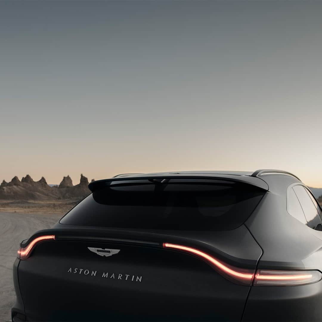 アストンマーチンのインスタグラム：「Unmistakably Aston Martin – this is DBX.  Click the link in our bio to book a test drive.  #AstonMartin #DBX」