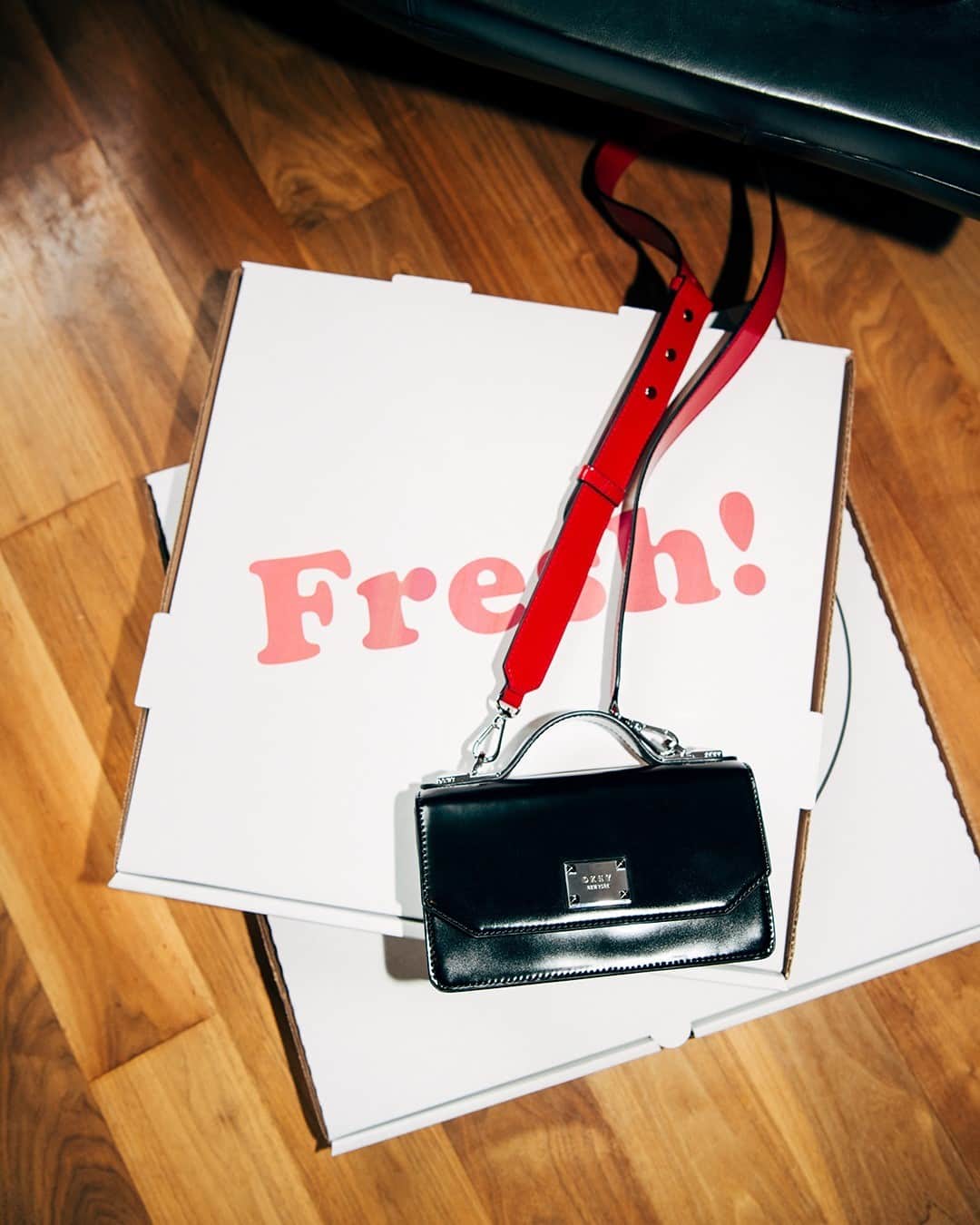 DKNYのインスタグラム：「Special delivery. Tap to shop the #DKNY Pearl Crossbody.」