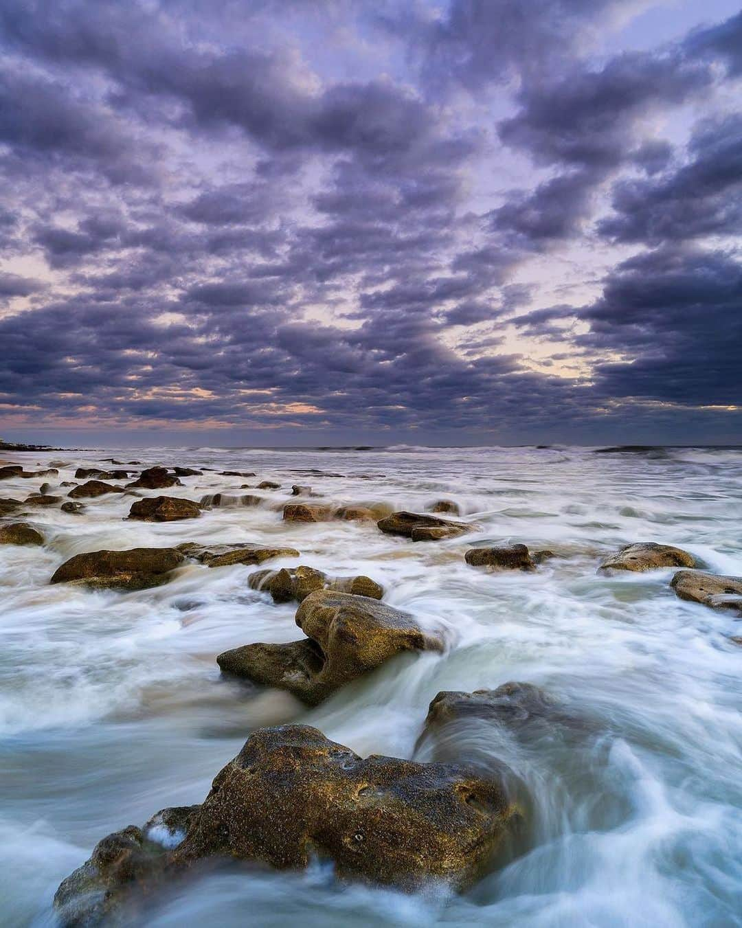 NikonUSAさんのインスタグラム写真 - (NikonUSAInstagram)「#NikonAmbassador @debsandidge: "To take this shot, I’m standing on the rocks with my tripod as the water rushes past me. I used a shutter speed that is long enough to convey a sense of motion with the turbulent ocean waves, and enough depth of field for the details. I liked the vertical orientation as it captures just enough of the story of the waves and clouds. I like how the clouds echo the rock formations, there was a nice rhythm from my vantage point. I shot with my Nikon Z 7II and NIKKOR Z 14-24mm f/2.8 S wide-angle lens, f/11, about a half second at ISO 100."  #Zcreators #NikonNoFilter #naturephotography #seascape #NikonZ7II #NIKKORZ」2月19日 4時46分 - nikonusa