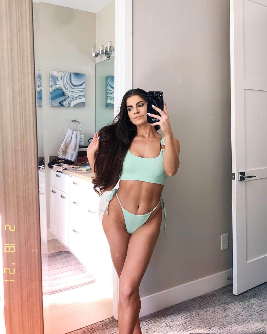 Paige Reillyのインスタグラム：「New @tolucaswim giving me minty mermaid vibes 🌿 Pretending it didn’t just snow in Denver lol - now I just need a vacation to wear them on lol 😩 ⁣ ⁣ Launch date is March 1st 🤍  I’m wearing the Clara top (eucalyptus XS/S *30-32 A-C cup*), Simone midi bottoms (eucalyptus XS) & Camilla skirt (eucalyptus XS/S) 💚🌿⁣ ⁣ Also this set just happens to match perfectly to the eye look I’ve been obsessed with this past week 🤩⁣」