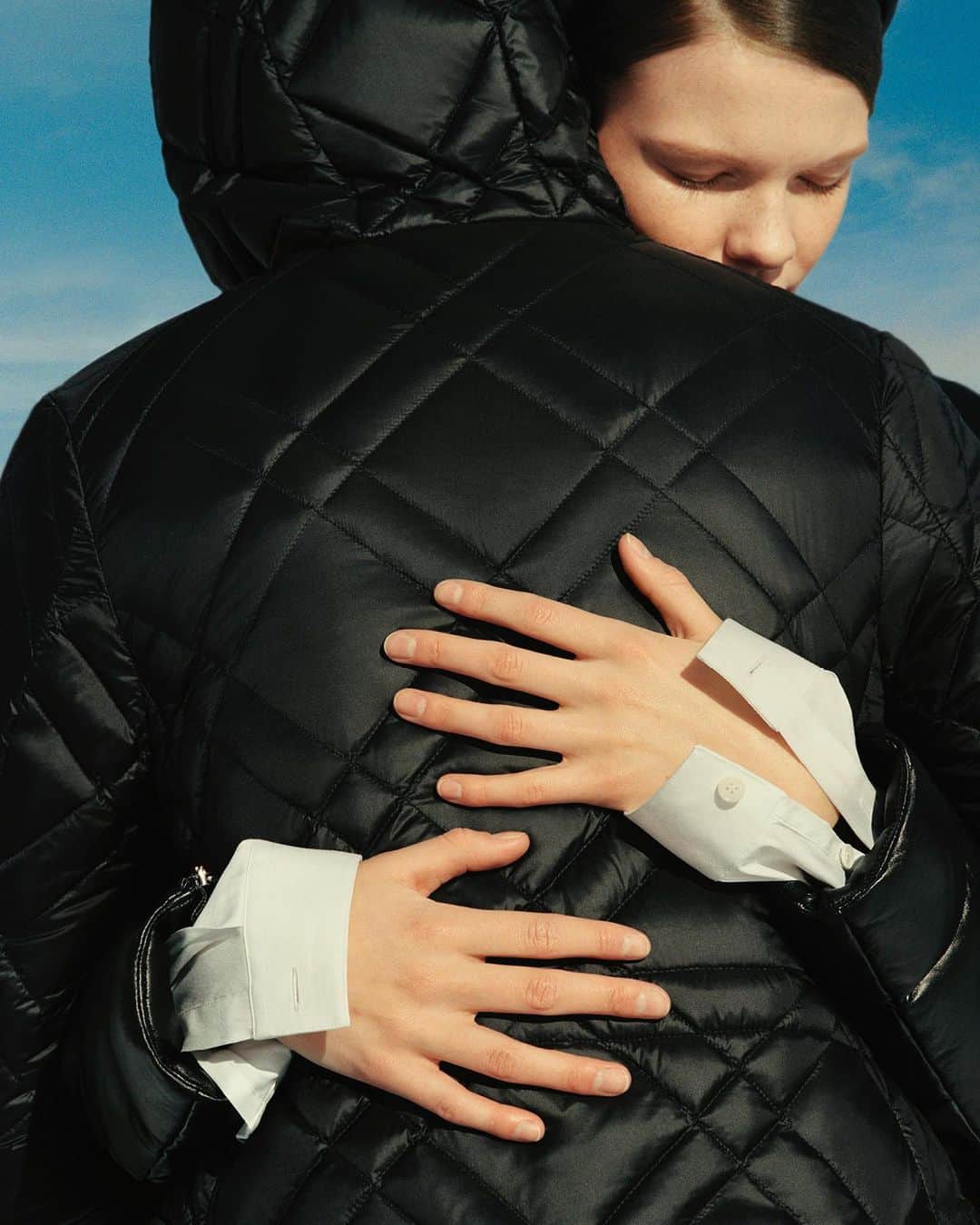 モンクレールのインスタグラム：「Embrace.   Fact: Oxytocin, “the love hormone,” is released by touch—or simply by making eye contact with another person, and being taken in.   #MonclerVoices  Photography @KotoBolofo」