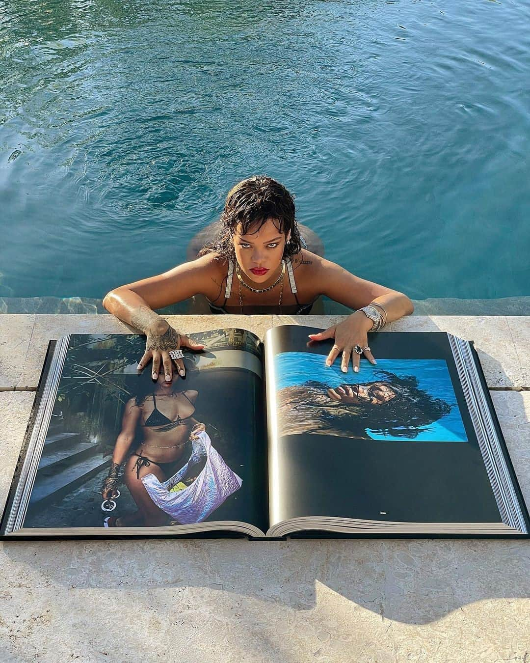 British Vogueさんのインスタグラム写真 - (British VogueInstagram)「“Reading is fundamental,” according to #Rihanna, and when you’re @BadGalRiri, you do it in a turquoise swimming pool in the Caribbean. Her tome of choice? The very limited-edition Queen-Sized version of her own autobiography, hand-sewn and bound in a custom Japanese fabric, and featuring more than 1,000 images of the musician and mogul through the years. Click the link in bio for more on Rihanna’s holiday reading.」2月19日 20時00分 - britishvogue