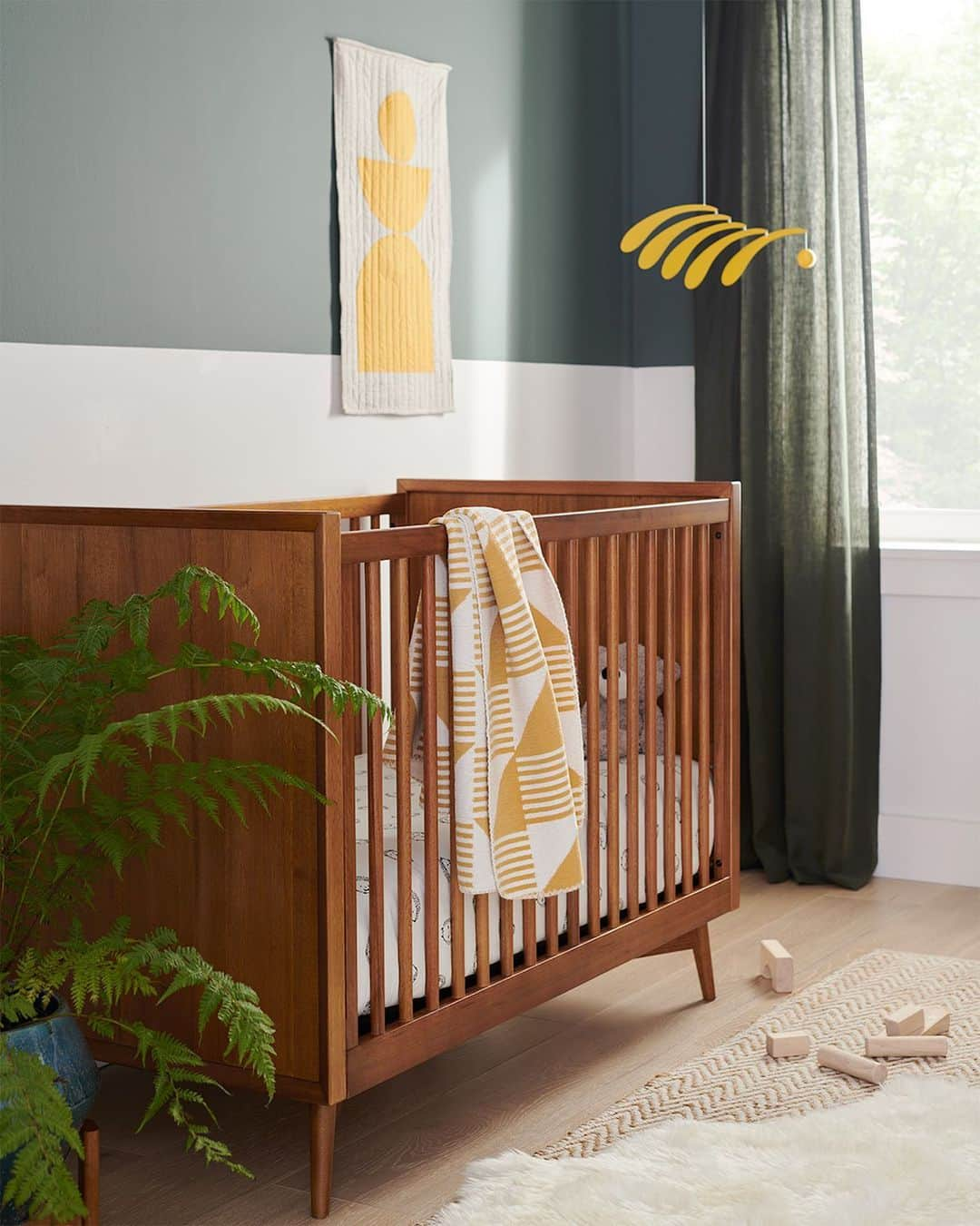 west elmさんのインスタグラム写真 - (west elmInstagram)「The kind of nursery that'll make you want to trade rooms with your kid 😉 Our @fairtradecertified Mid-Century Convertible Crib grows with your baby — it features two platform height options and can be converted into a cozy toddler bed with the matching conversion kit. Tap the link in our bio to shop! (Paint color: Hunt Club SW 6468 by @sherwinwilliams) #WestElmKids #FairTradeFriday」2月20日 5時05分 - westelm