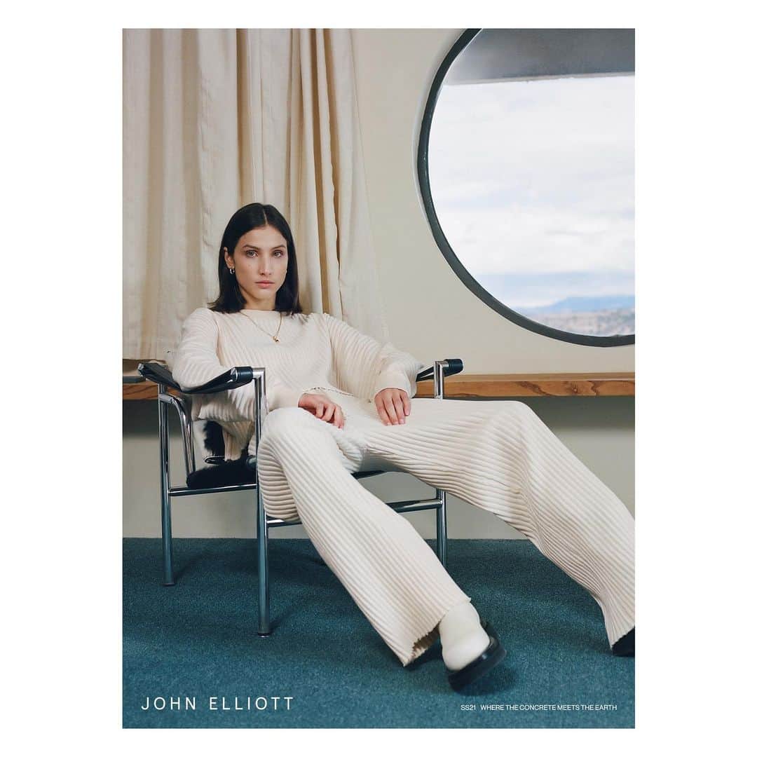 ジョン エリオットのインスタグラム：「2/3. The Spring / Summer 2021 Collection explores the tension point of polished tradition and spontaneous, organic creation. The title evokes a visual concept — ripping cold concrete out to expose the earth’s warmth underneath — “Where the Concrete Meets the Earth.”    Photography: @paleyfairman  Art Direction: @p.lo  Model: @victoria.massey」