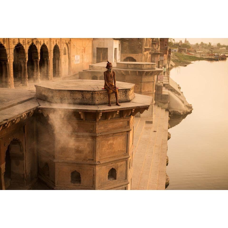 thephotosocietyさんのインスタグラム写真 - (thephotosocietyInstagram)「Photo by @andyrichterphoto//Meditation on the Yamuna River at Keshi Ghat in Vrindavan. Krishna is believed to have bathed here after killing the demon Keshi, who symbolizes pride in ones devotional practices, vanity and ego. Bhakti yogis curtail such tendencies through chanting and humble service. . From the series and monograph Serpent in the Wilderness. Follow me @andyrichterphoto for more photographs and stories on yoga and beyond. The feature “Finding Calm”, written by Fran Smith, was published in the January 2020 issue of the magazine and explores the myriad benefits of yoga. @thephotosociety @natgeo #yoga #asana #meditation #serpentinthewilderness #kehrerverlag #andyrichter #andyrichterphoto」2月21日 6時43分 - thephotosociety