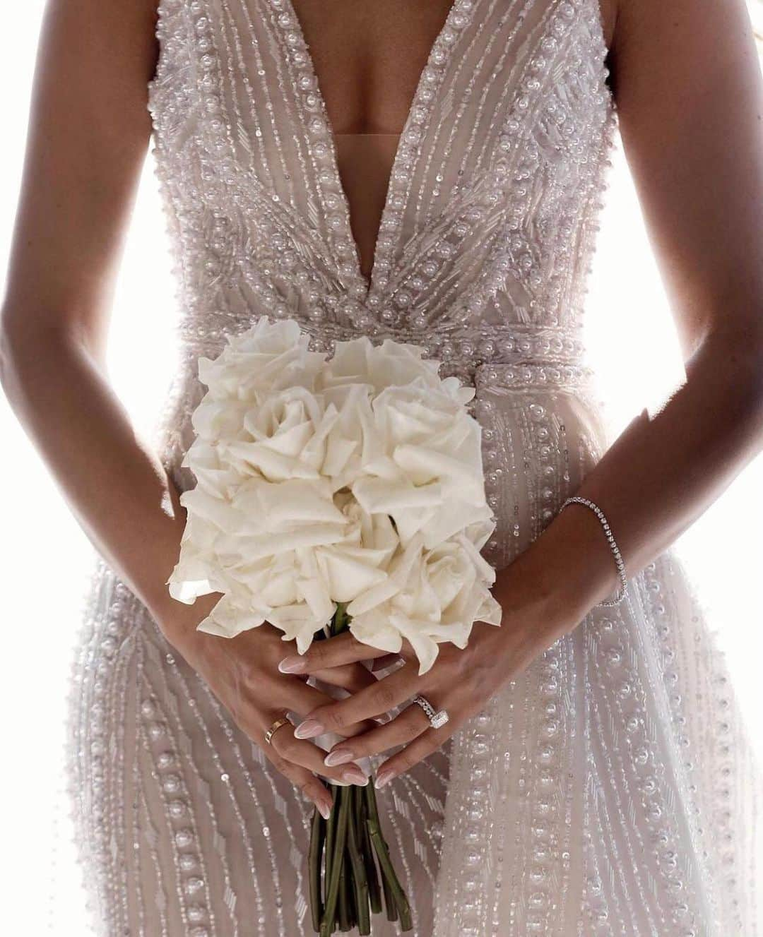 Steven Khalilさんのインスタグラム写真 - (Steven KhalilInstagram)「Intricate hand beaded pearl lines carefully placed to compliment Natalie’s silhouette @imagehausweddings @kaileykirkeventsandweddings」2月21日 14時32分 - steven_khalil