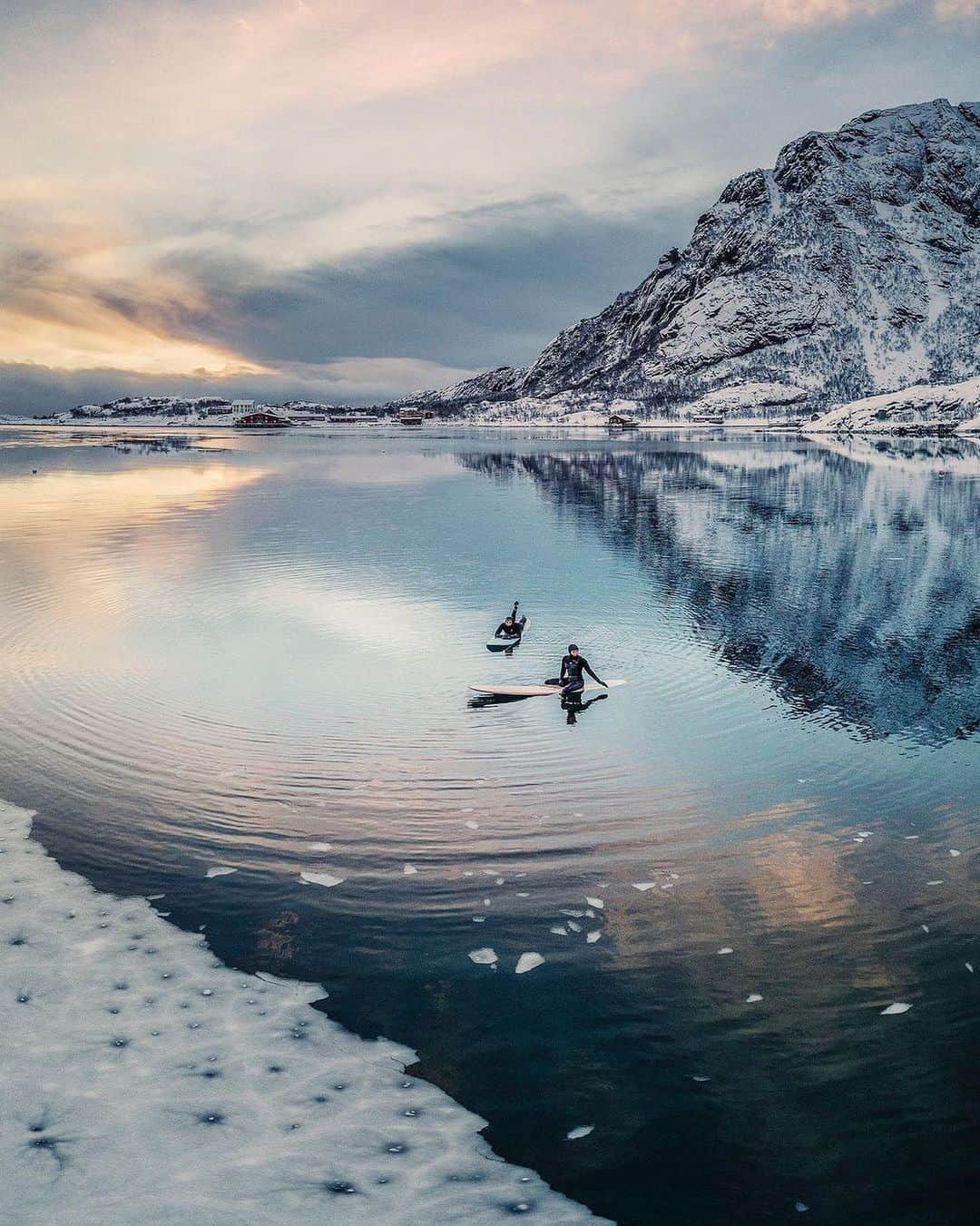 Instagramさんのインスタグラム写真 - (InstagramInstagram)「#HelloFrom the Lofoten Islands, Norway. 🏄‍♀️❄️⁣ ⁣ We are dreaming of paddling out on this icy fjord with these Arctic surfers.⁣ ⁣ “Most people wouldn’t expect to find surf waves here beyond the Arctic Circle,” says photographer Andrea Frazzetta (@andrea_frazzetta). “But on other parts of the coast, the Lofoten Islands have some of the⁣  world’s best conditions for cold-water surfing.”⁣ ⁣ Photo by @andrea_frazzetta」2月22日 1時59分 - instagram