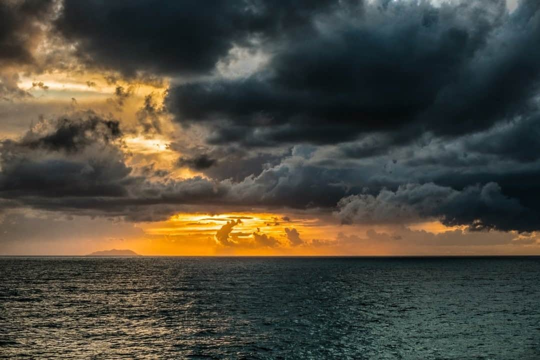 National Geographic Travelさんのインスタグラム写真 - (National Geographic TravelInstagram)「Photo by @francescolastrucci / The sunset finds its way through the thick, stormy clouds near the Port of Livorno, Italy, illuminating Gorgona Island, one of the seven islands of the Tuscan archipelago off Tuscany's Tyrrhenian coast. A few months ago I had to come back from Sicily, where I ended up after a long assignment across the country. Too tired to face the long drive, I opted for the ferry—a slow 20-hour journey across the Tyrrhenian Sea where all I had to do was get some good rest, read, and, from time to time, photograph the beautiful electric views of the sea.  Follow me @francescolastrucci for more places, daily life, and stories around the world. #italy #sea #landscapephotography #mediterranean」2月21日 20時38分 - natgeotravel