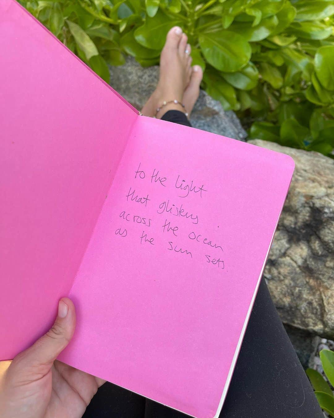 レイチェル・ブレイセンさんのインスタグラム写真 - (レイチェル・ブレイセンInstagram)「We cleaned out the shed today and I guess this notebook was hiding in an old drawer of an old dresser or something because all of a sudden it was lying on top of a stack of books in the front yard. I haven’t seen it in years.   This is the journal I started when @ahlaluna died. For the longest time I thought this would be the title of the book I eventually ended up writing about that very same time of my life, the book that started out about friendship and loss but somehow became a memoir. The book that changed my life.  To the light that glitters across the ocean as the sun sets.   Even though as a book title it’s long and a little odd and To Love and Let Go was a good choice I still think of this as the original title because this was the journal I opened up every day when the pain became too much to bear and the only way to lighten it was to talk to her.   After the accident, when I lost all faith in life and stopped listening altogether, she spoke to me through glittering light. When I was so sore from the surgery I couldn’t stand up and when all I wanted to do was lie in a dark room, it was the light glittering across the ocean that got me up and outside for the first time. I remember standing on the dock, belly wrapped in bandages, the light beckoning me. I threw my clothes off and jumped in. When I surfaced, I was floating in a sea of diamonds. Light, everywhere. It was the most beautiful thing I had ever seen and within me, something moved. I took a deep breath and shouted as loud as I could; “I feel something!” because for so long, I had been numb. But there, naked in the light, was something.  This entire journal is an ode to that light. An ode to her. It was a monologue that became a conversation the moment I started trusting in life enough to listen again.   Next month it will be 7 years. She still visits. And I’m still listening.   🐺🤍」2月22日 7時25分 - yoga_girl