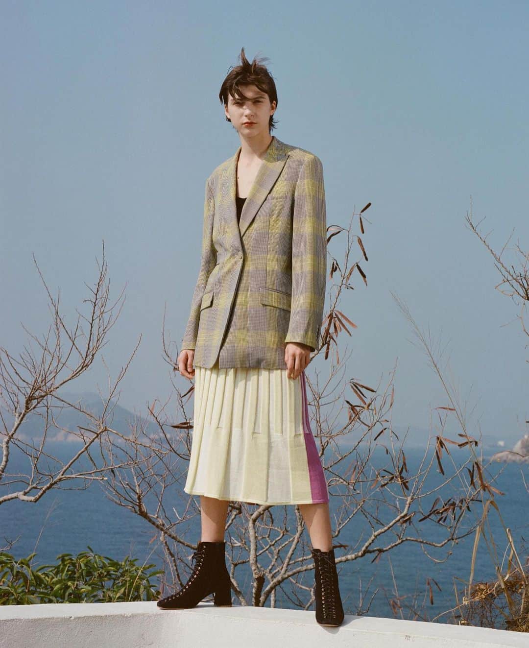 のインスタグラム：「Hugging your curves in @portspure - This Spring, Ports Pure brings a playful mood into your wardrobe.  The pencil skirt comes in contrast colors and pleated design for a unique twist to pair the plaid pattern blazer and @byfar_official boots perfectly ! - #ITHK #ITisInspiration #portspure #byfar #springwardrobe」