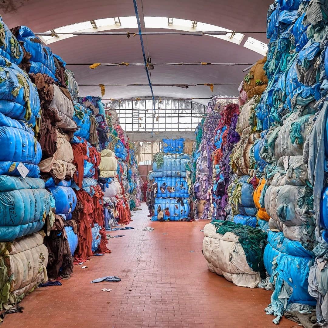 ナショナルジオグラフィックさんのインスタグラム写真 - (ナショナルジオグラフィックInstagram)「Photo by @lucalocatelliphoto / Piles of discarded wool await  recycling in Prato, Italy, a small town in Tuscany that's been the epicenter of wool recycling for centuries. Today 15% of the world’s recycled textiles come from Prato.   The recycling process starts with collection and sorting of textile. These piles of rags have been carefully selected by experienced workers, separating the clothes into different colours. Once packaged, some colours may end up sitting in a warehouse for decades, waiting to be requested by the fashion industry. Only when demanded these tightly enveloped rags are unwrapped and put through recycling to create new raw wool.  Prato was featured in my latest story for National Geographic magazine titled the "End of Trash." What was once considered a discarded item is now a commodity and a symbol for sustainable industrial production.  Please follow me @lucalocatelliphoto to find out more about  the new technology solutions for a more sustainable world.  #prato #waste #environment #italy #lucalocatelliphoto  Check out Nat Geo's link in bio for more on this story.」2月22日 12時34分 - natgeo