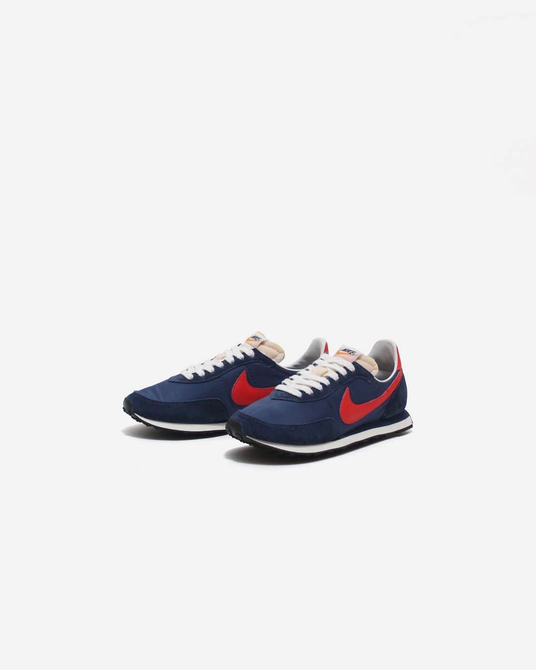 A+Sさんのインスタグラム写真 - (A+SInstagram)「2021. 2. 25 (thu) in store ﻿ ■NIKE WAFFLE TRAINER 2 SP﻿ COLOR : MIDNIGHT NAVY/MAX ORANGE-MYSTIC NAVY﻿ SIZE : 26.0cm-29.0cm﻿ PRICE : ¥12,100 (tax incl.) ﻿ モカシンをイメージしたアッパーとワッフルアウトソールが、1977年のオリジナルを彷彿とさせるワッフル トレーナー 2。ウエッジミッドソールで伝説のシルエットを強化しつつ、形状記憶フォームのソックライナーや密度の異なる2種類のフォームミッドソールを採用して、最新のアップデートを施した。世界レベルの職人技を駆使したナイロンとスエードの組み合わせに、クラシックなアウトソールがあらゆる路面で耐久性に優れたトラクションを発揮する。このエディションでは、ベースカラーのミッドナイトネイビーに、マックスオレンジがエネルギッシュなアクセントを添える。﻿ ﻿ A waffle trainer 2 with a moccasin-inspired upper and waffle outsole that is reminiscent of the 1977 original. While enhancing the legendary silhouette with the wedge midsole, we have adopted the sockliner of shape memory foam and two types of foam midsole with different densities, and made the latest update. A combination of world-class craftsmanship in nylon and suede, the classic outsole provides durable traction on all surfaces. In this edition, Max Orange adds an energetic accent to the base color Midnight Navy.﻿ ﻿ #a_and_s﻿ #NIKE﻿ #NIKEWAFFLETRAINER﻿ #NIKEWAFFLETRAINER2SP」2月22日 12時32分 - a_and_s_official