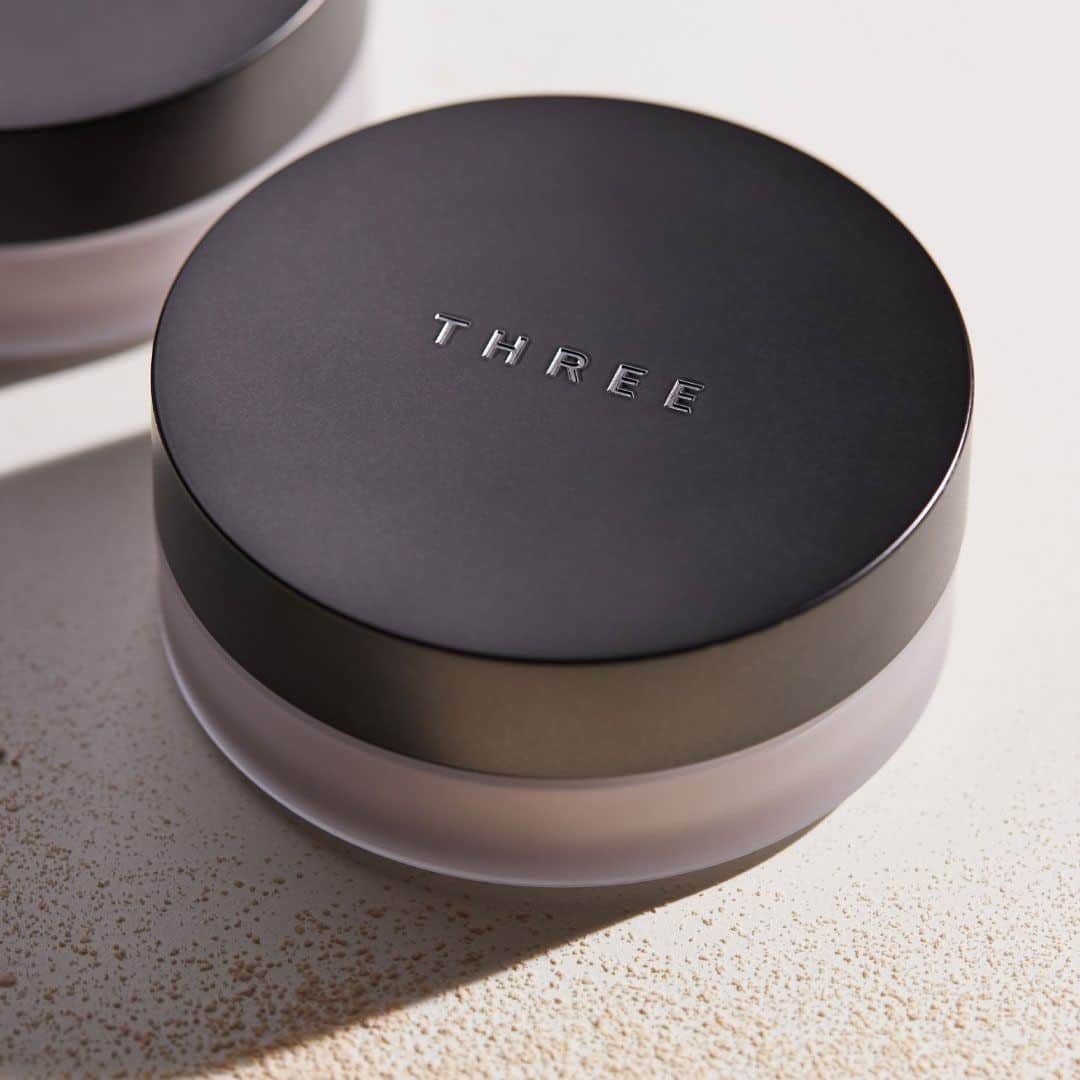 THREEのインスタグラム：「・ ＜いよいよ明日発売＞ THREE NEW BASE MAKEUPのコンセプトでもある「ラディアントスキン」。 THREE が提案する“ラディアント”には、光り輝く、晴れやかなという意味のもと、 「朝になると太陽が昇り、ふたたび世界が晴れ渡るように。」というメッセージが込められています。 ―――――――――――――― THREE アドバンスドエシリアルスムースオペレーター プライマー(全1種) THREE アドバンスドエシリアルスムースオペレーター フルイドファンデーション(全8色) THREE アドバンスドエシリアルスムースオペレーター ルースパウダー(全2種)  2021年2月24日（水）発売 ――――――――――――――  <MOVIE＞ 新ベースメイクシリーズの使い方や仕上がりを動画でもご紹介中。 プライマー、ファンデーション、ルースパウダーで仕上げる、フローレスでありながらまるで素肌のように自然な表情。  みなさまも、生命感あふれるラディアントスキンを、ぜひご覧ください。 t.ly/wLON  #THREE #NEWBASEMAKEUP #threecosmetics #ラディアントスキン」