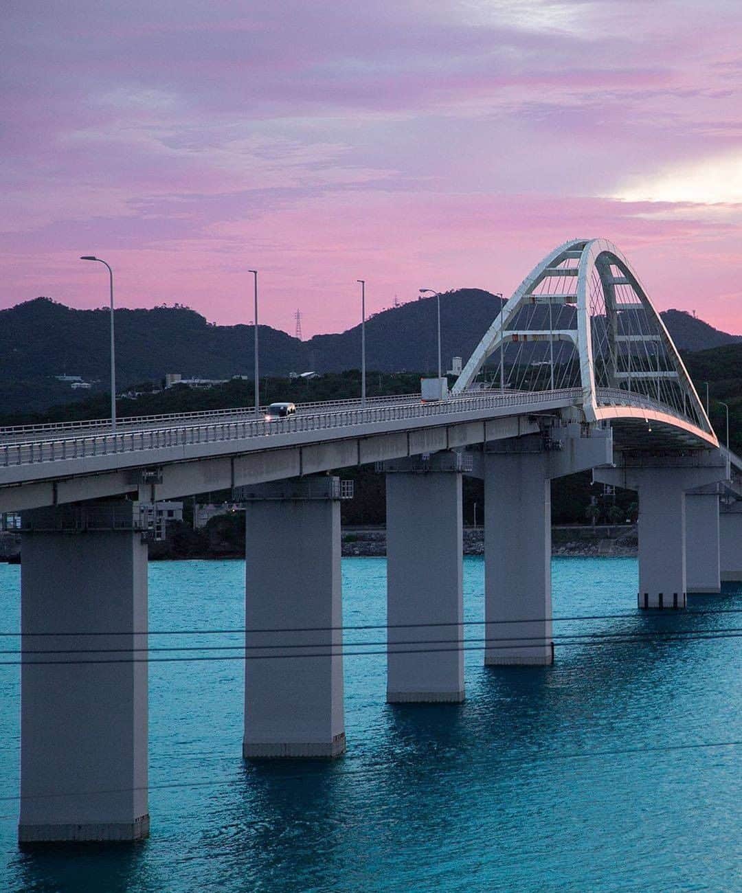 Be.okinawaさんのインスタグラム写真 - (Be.okinawaInstagram)「You’ll want to cross over the bridge to see a beautiful sunrise! What a fun way to begin your day!  📍: Sesoko Bridge / Sesoko Island 📷: @atsushi_bluesea Thank you very much for the wonderful photos!  Thanks to "Sesoko Bridge," which connects Okinawa main island and Sesoko Island, local people’s lifestyles became much easier. Having a convenient access to surrounding islands is a part of the attractiveness of Okinawa, but why not contemplate the lifestyle of those islands a bit?  Tag your own photos from your past memories in Okinawa with #visitokinawa / #beokinawa to give us permission to repost!  #瀬底大橋 #sesokobridge #세소코오하시대교 #瀬底島 #sesokoisland #瀨底島 #세소코섬 #bridge #longbridge #seaside #japan #travelgram #instatravel #okinawa #doyoutravel #japan_of_insta #passportready #japantrip #traveldestination #okinawajapan #okinawatrip #沖縄 #沖繩 #오키나와 #旅行 #여행 #打卡 #여행스타그램」2月23日 19時00分 - visitokinawajapan