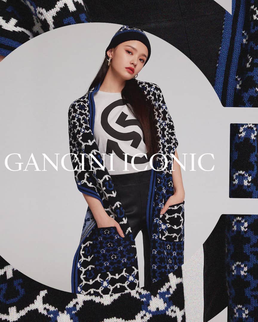 サルヴァトーレ・フェラガモのインスタグラム：「Graphic Impact. Presenting the new Gancini Iconic monogram, re-imagined from one of the most emblematic codes of house insignia. The charming Jelly Lin plays with the high-octane print in bold and varied iterations updated this season. #Gancini」